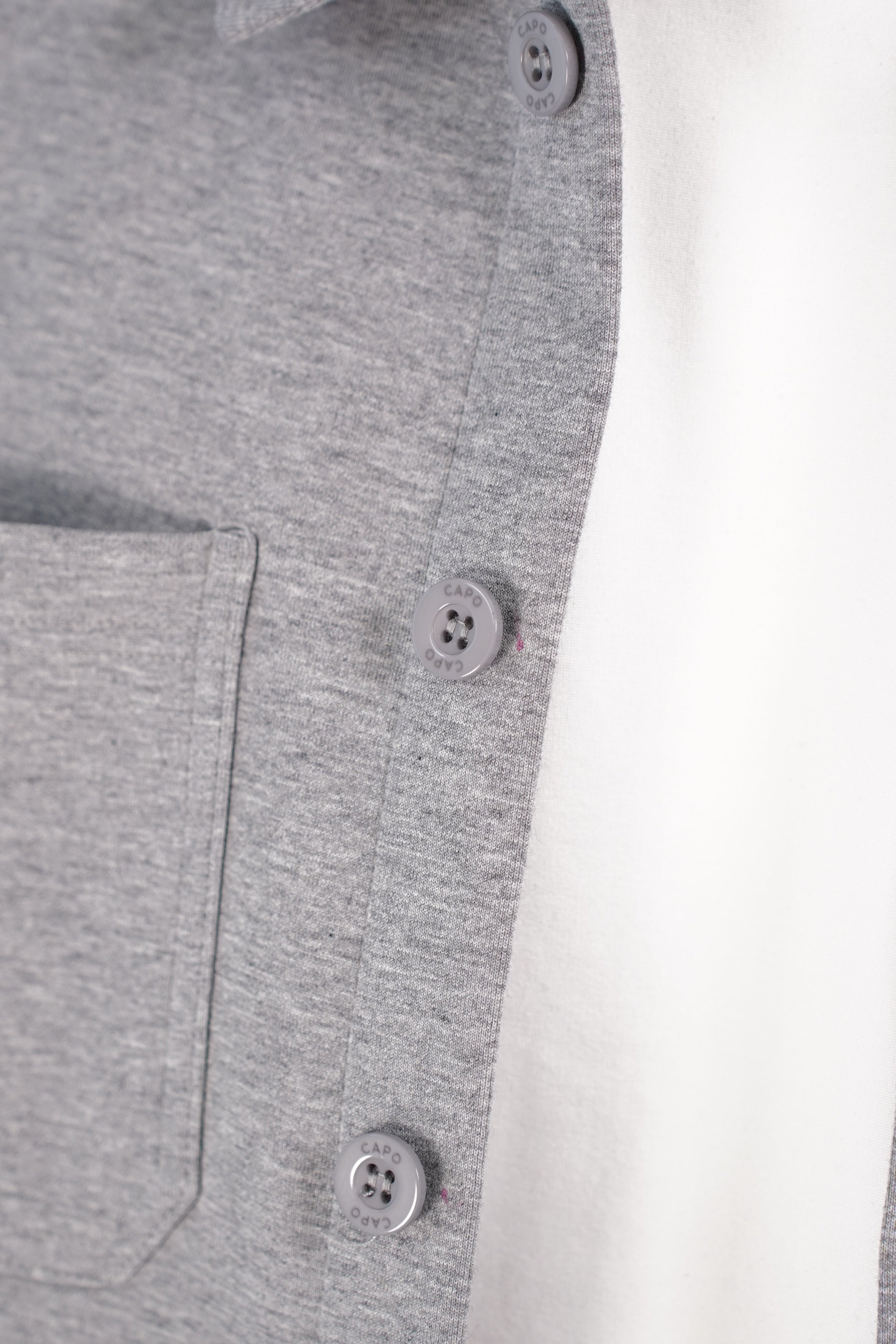 Detail view of CAPO Smart Button Light Grey Overshirt