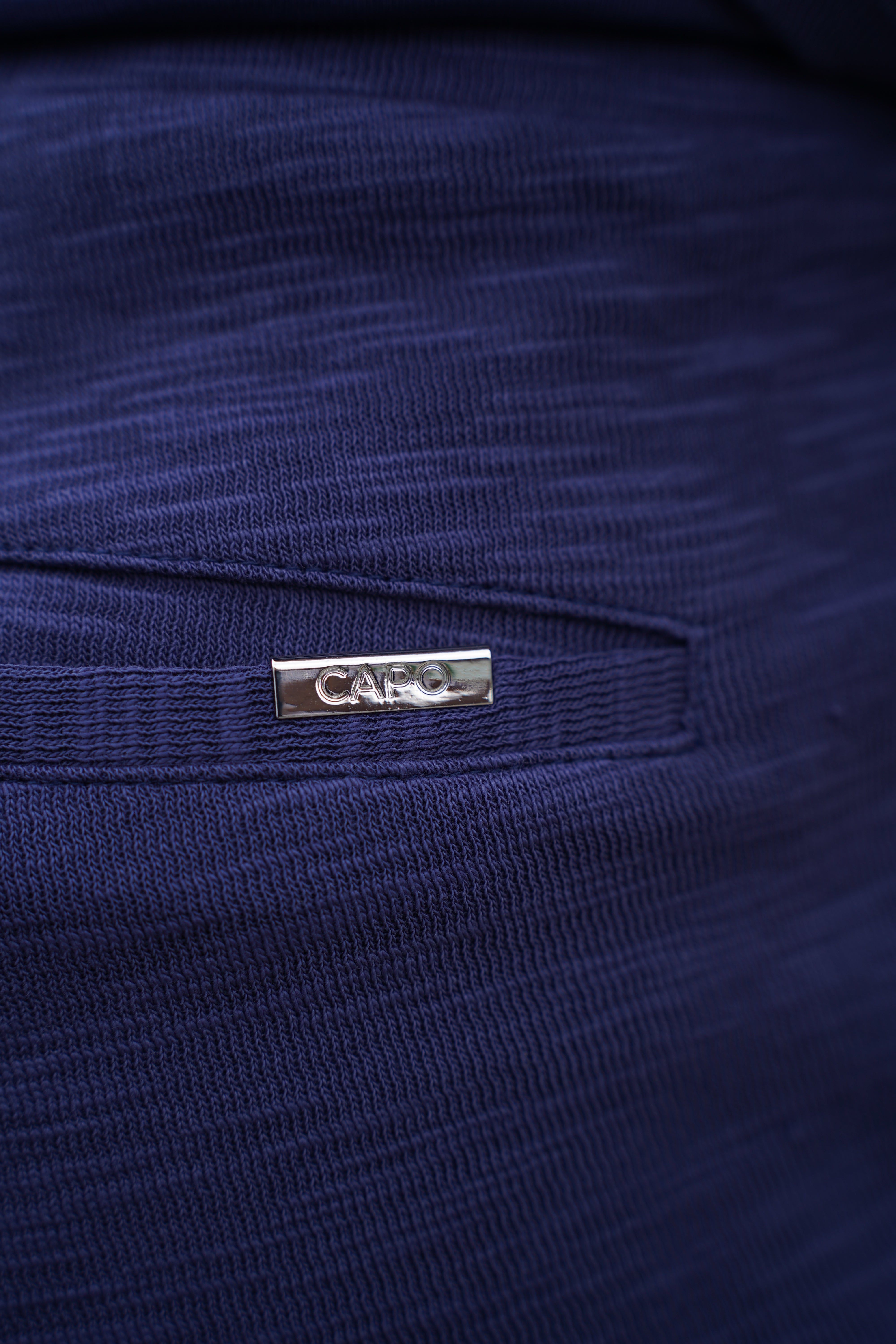 logo view of CAPO Jersey Slub Navy Shorts