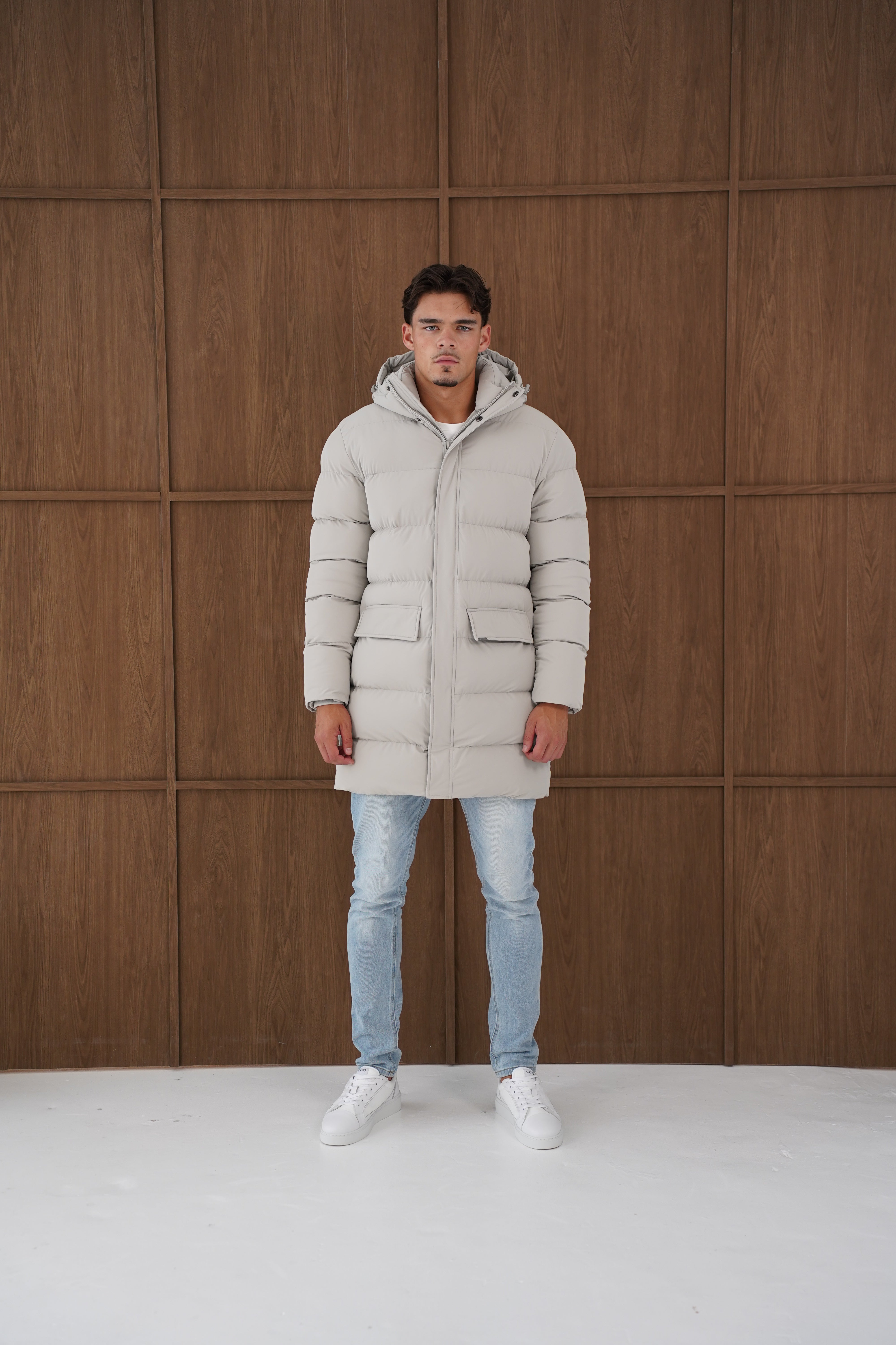 Model front view of CAPO Mid Length Stone Puffer Jacket
