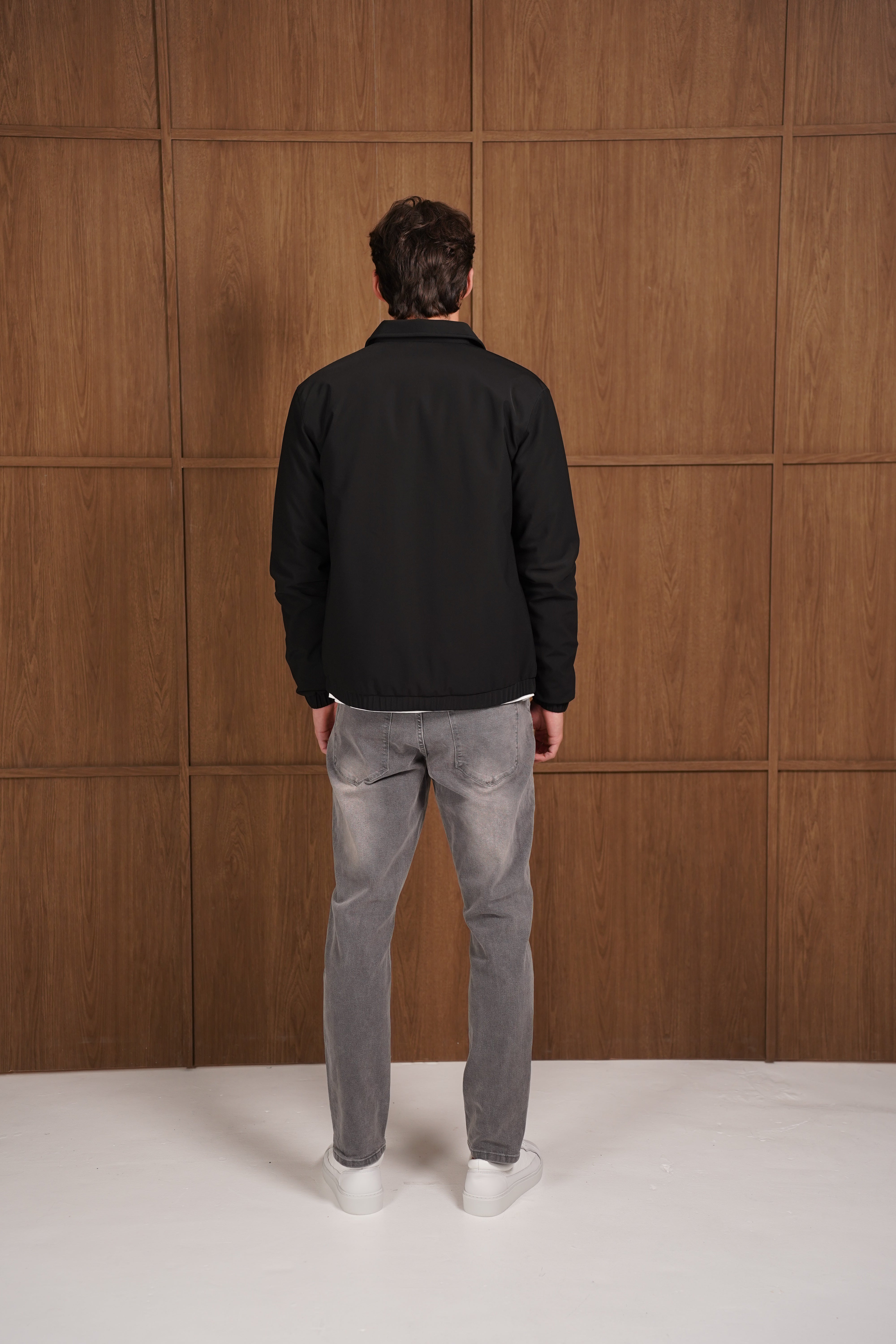 Model back view of CAPO Padded Collar Black Jacket