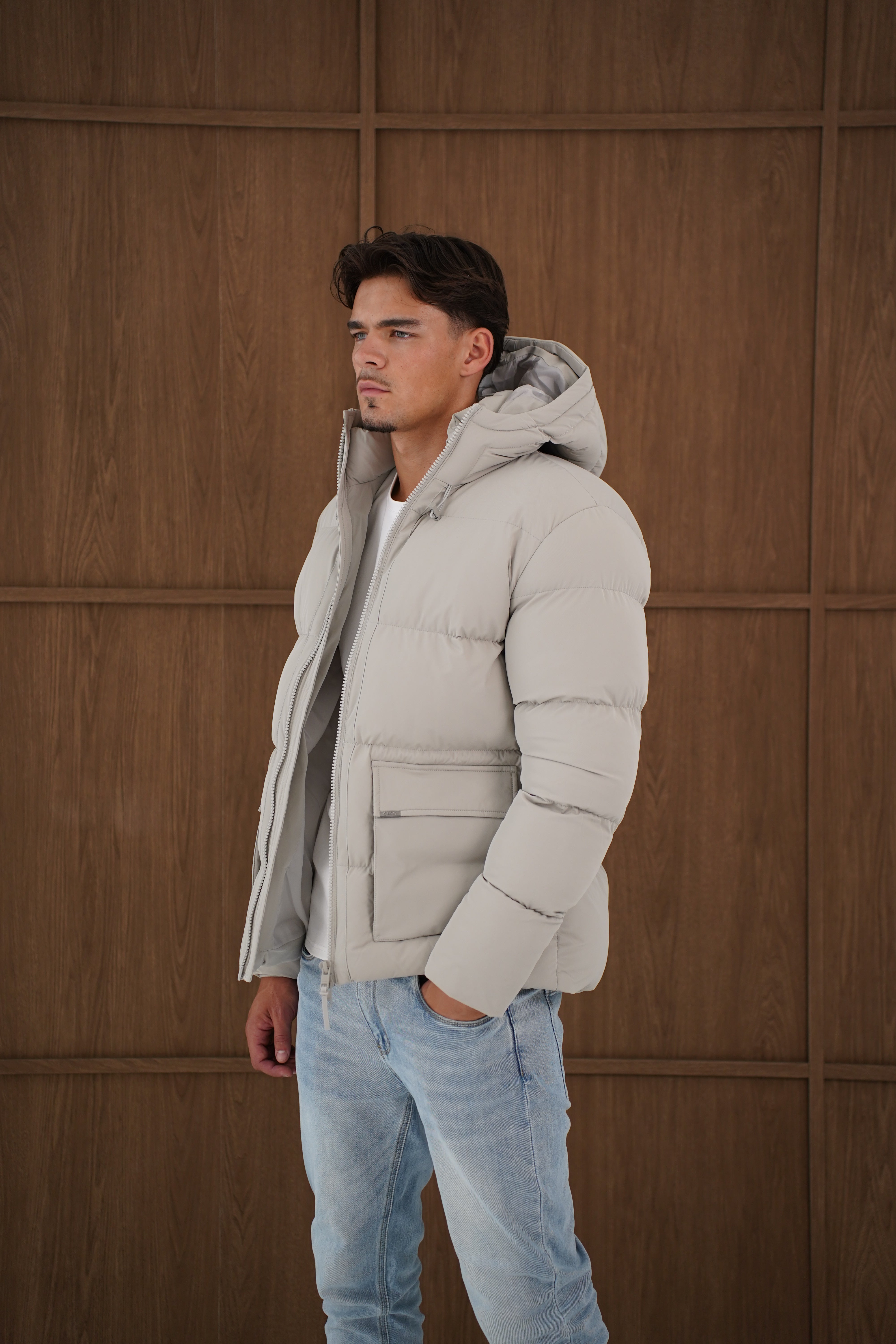 Model side view of CAPO Stone Puffer Jacket