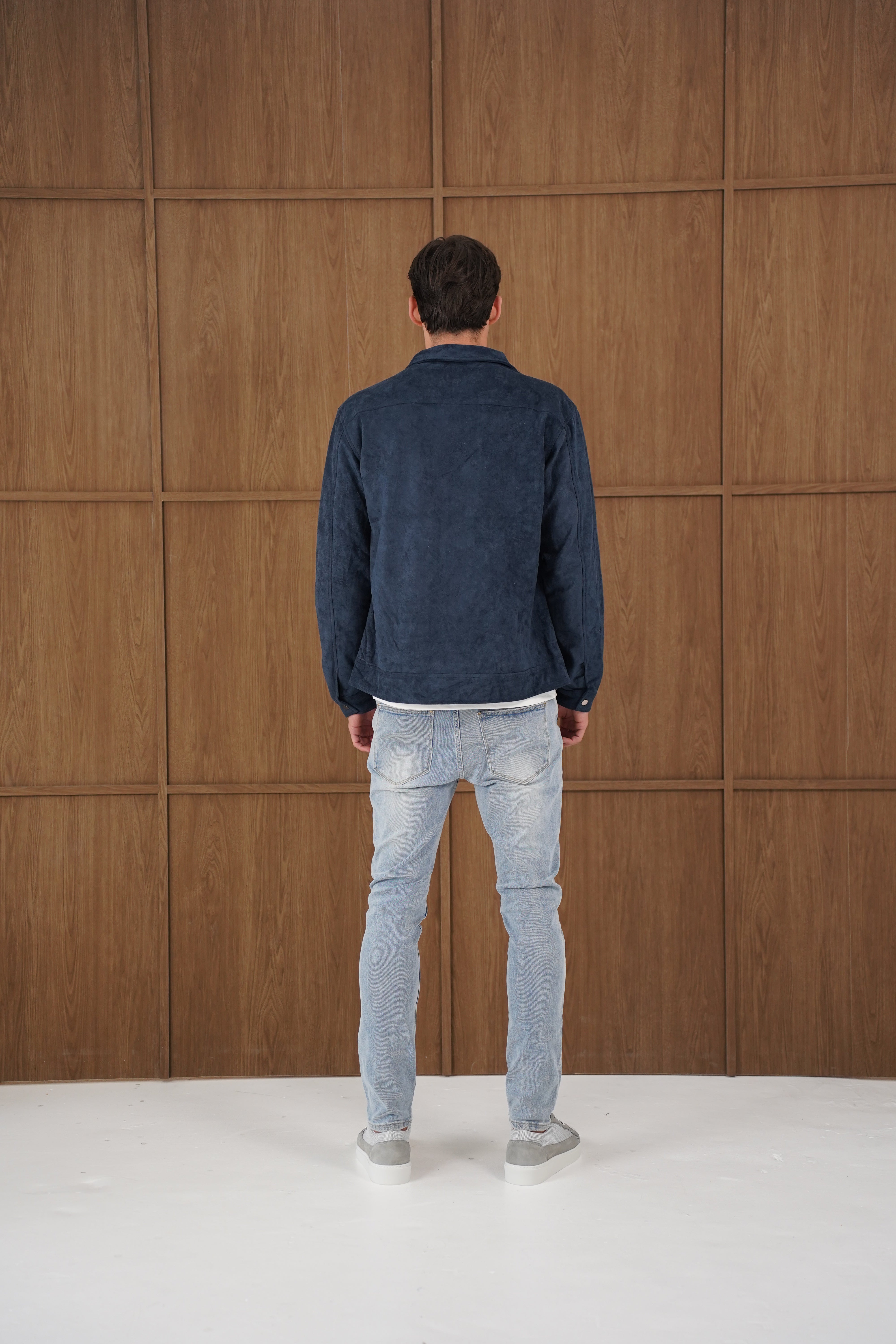 Model back view of CAPO Suede Navy Jacket