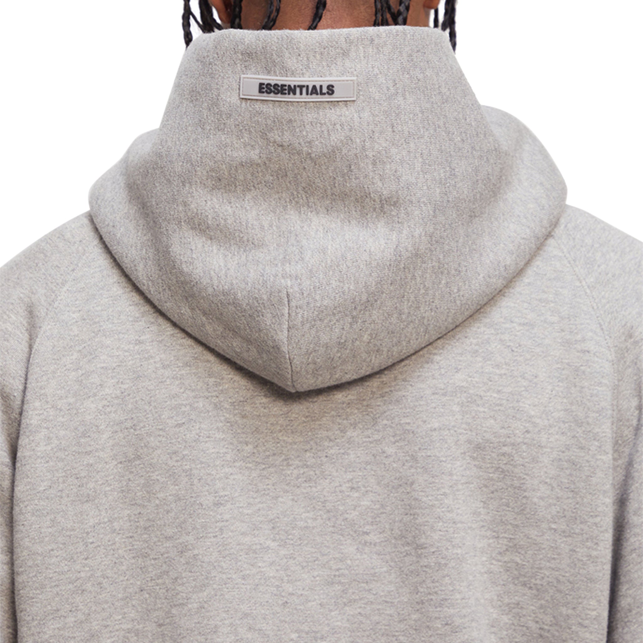 Model detail view of Fear Of God Essentials Heather Oatmeal Hoodie