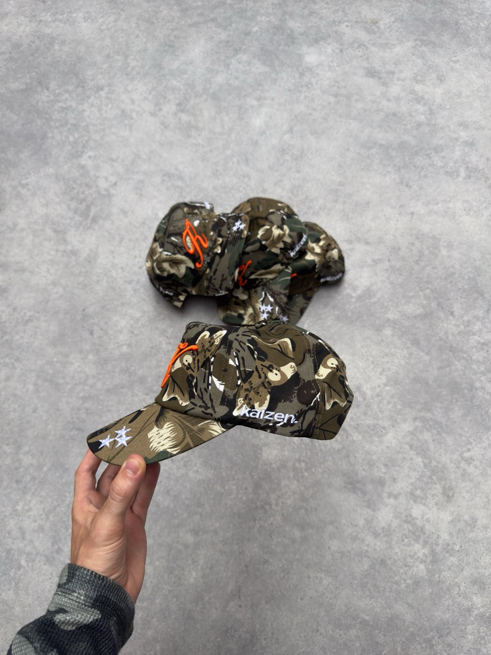 Side view of Kaizen Market Script Camo Cap