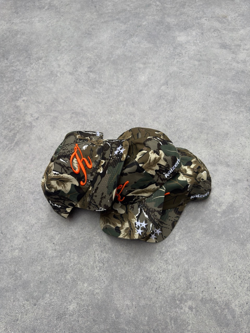 Detail view of Kaizen Market Script Camo Cap