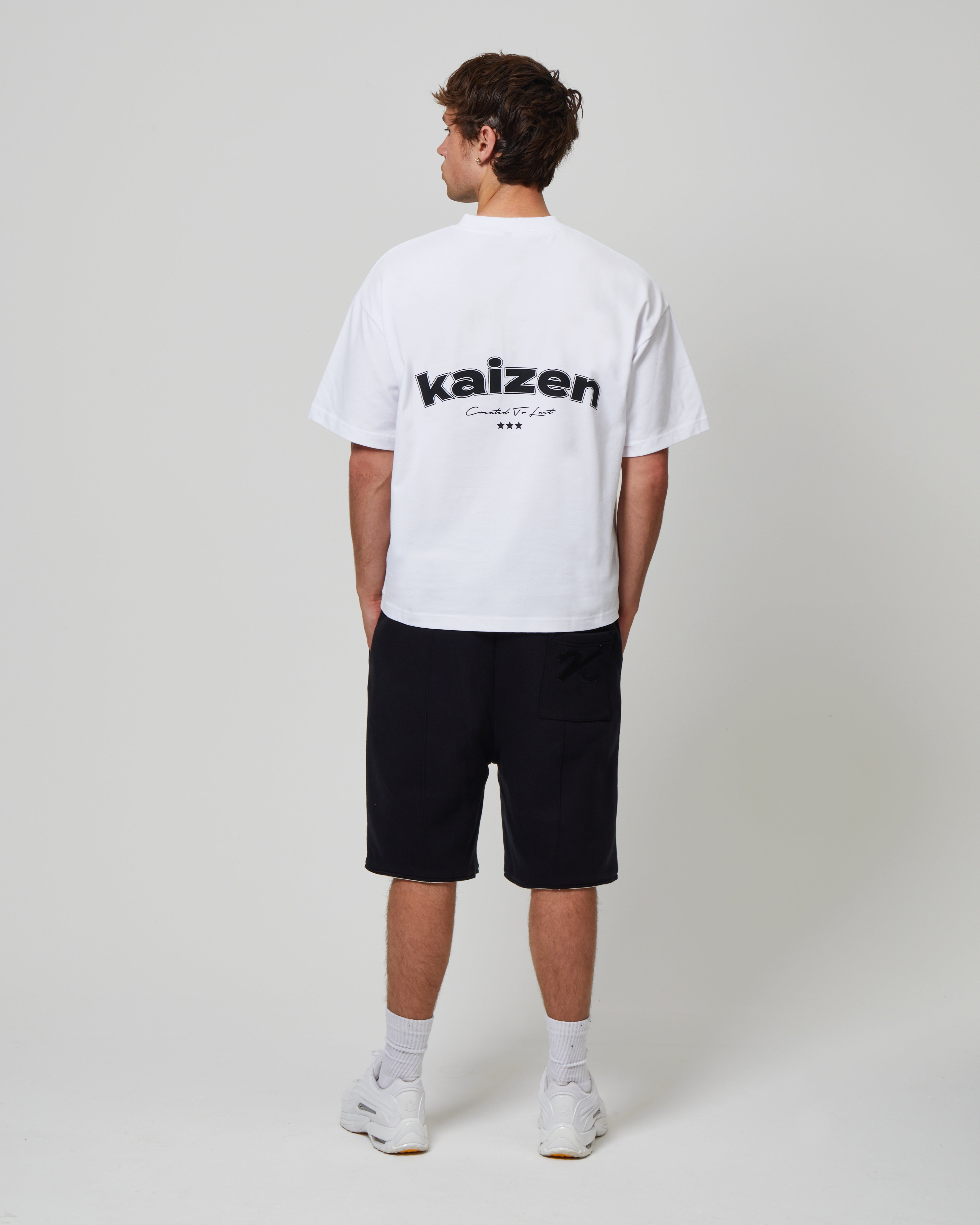 Back view of Kaizen Market Arch White T-shirts