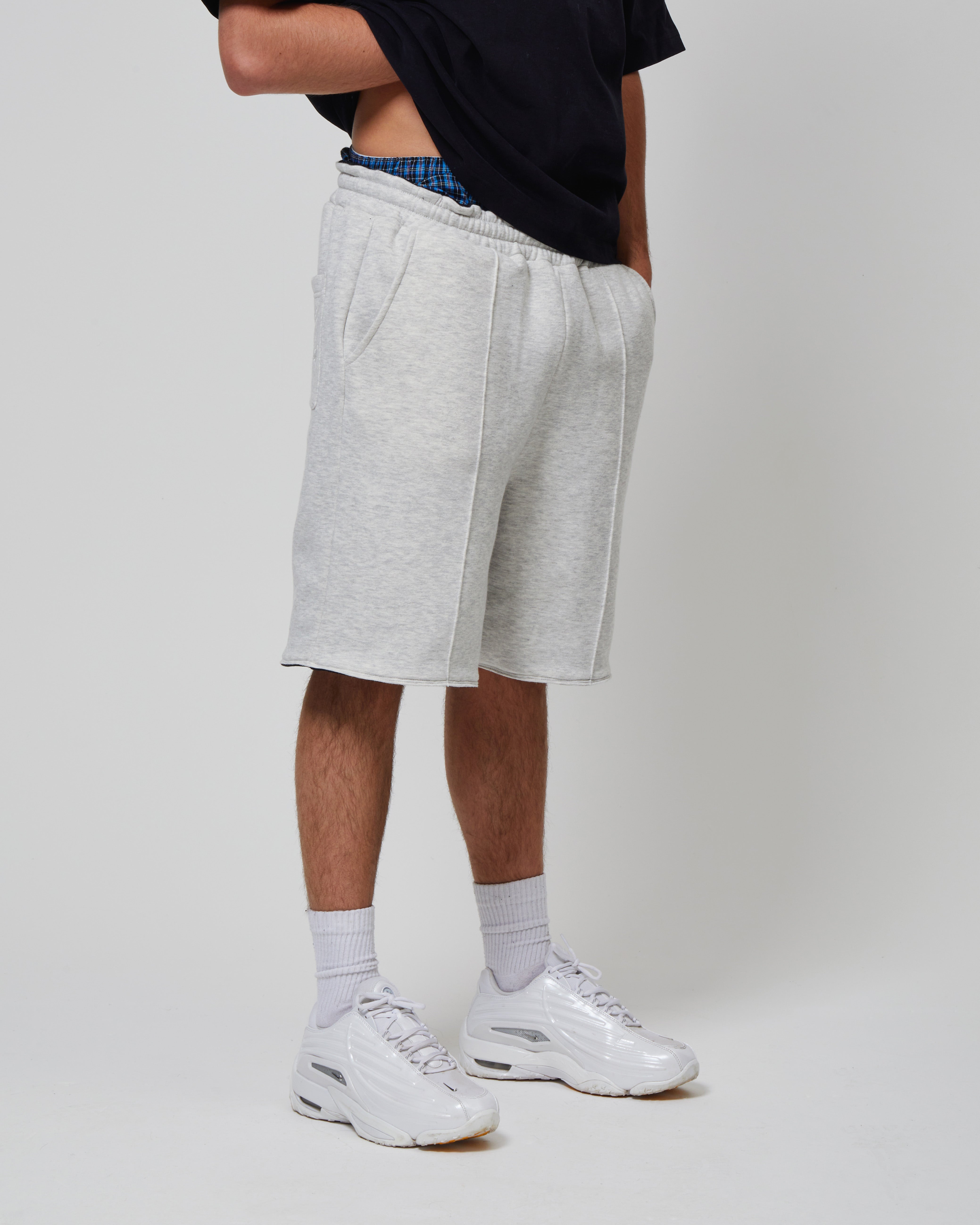 Side view of Kaizen Market Reversible Grey/Black Shorts