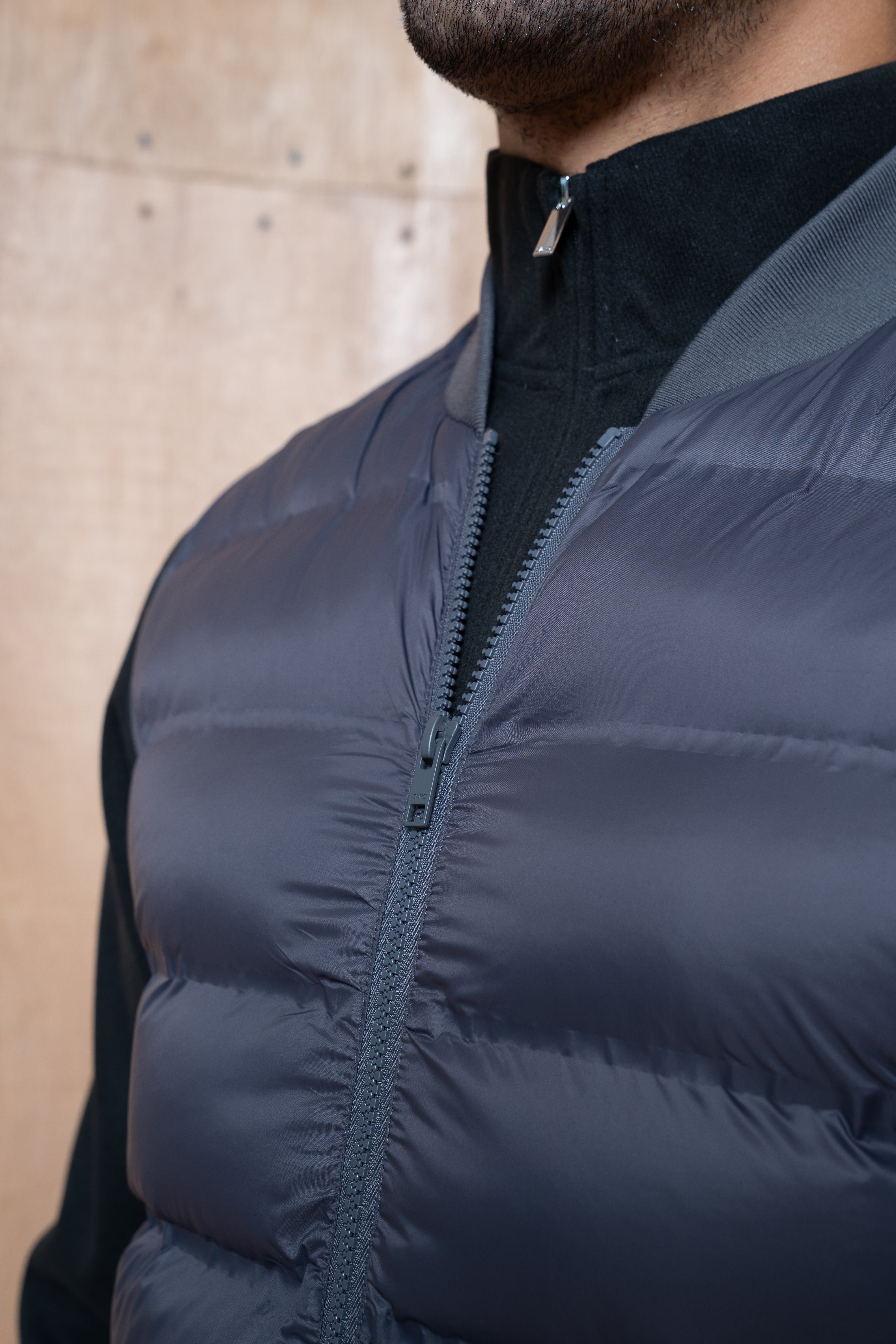 Detail view of CAPO Tech Asphalt Puffer Gilet
