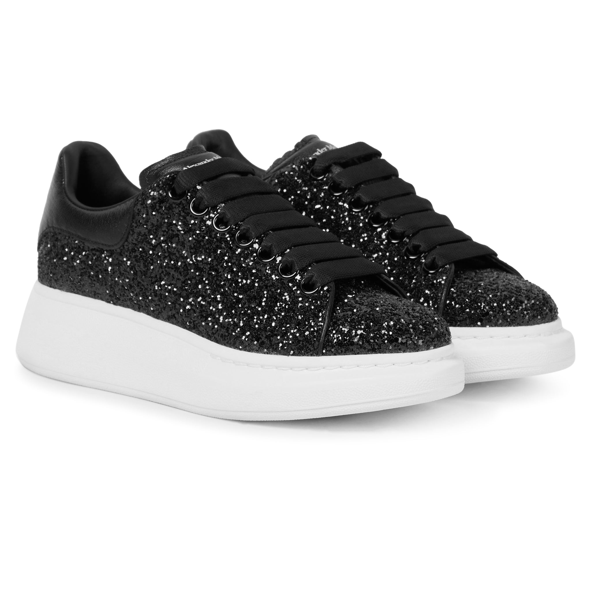 Front side view of Alexander Mcqueen Raised Sole Black Glitter Trainers