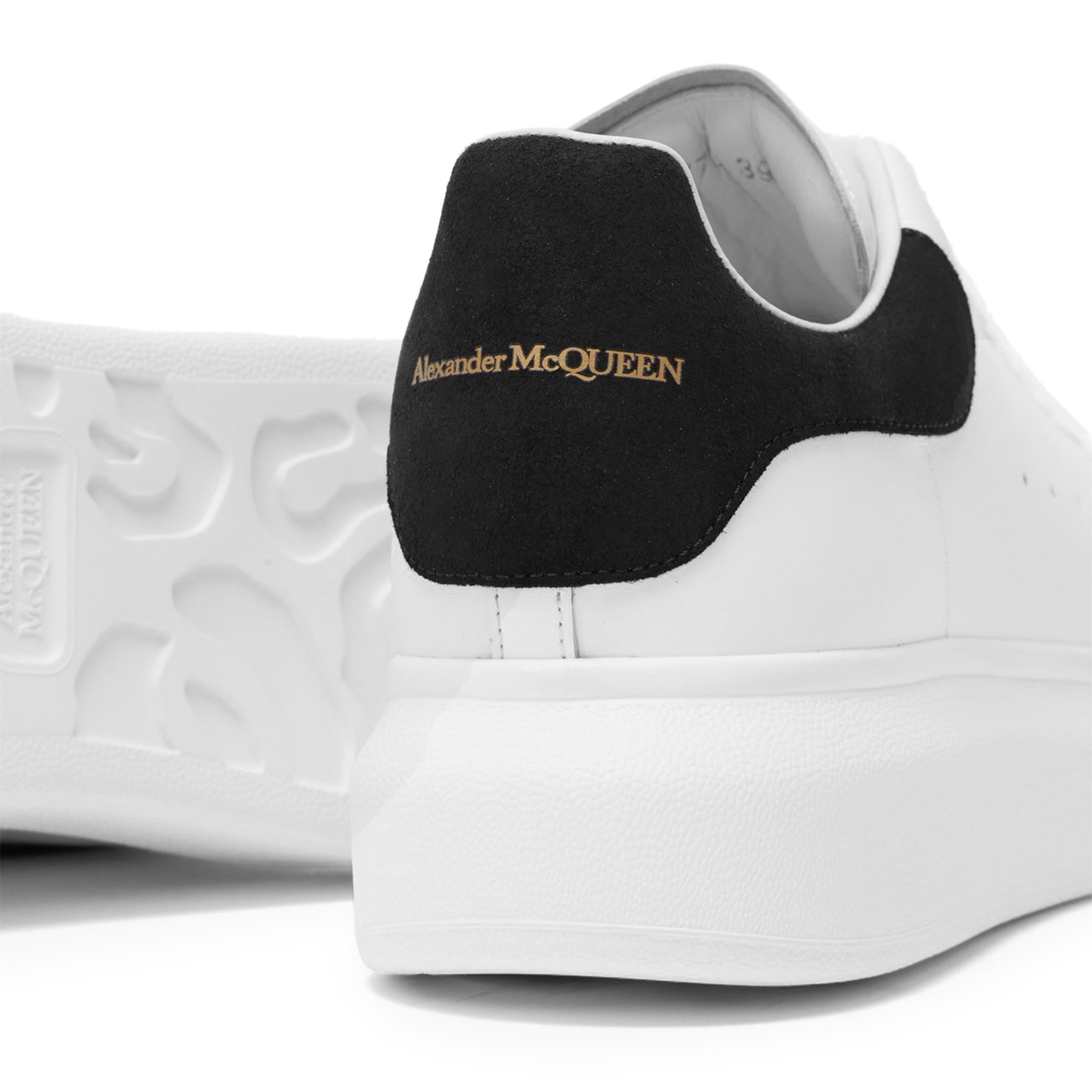 Detail view of Alexander Mcqueen Raised Sole White Black Suede Sneaker