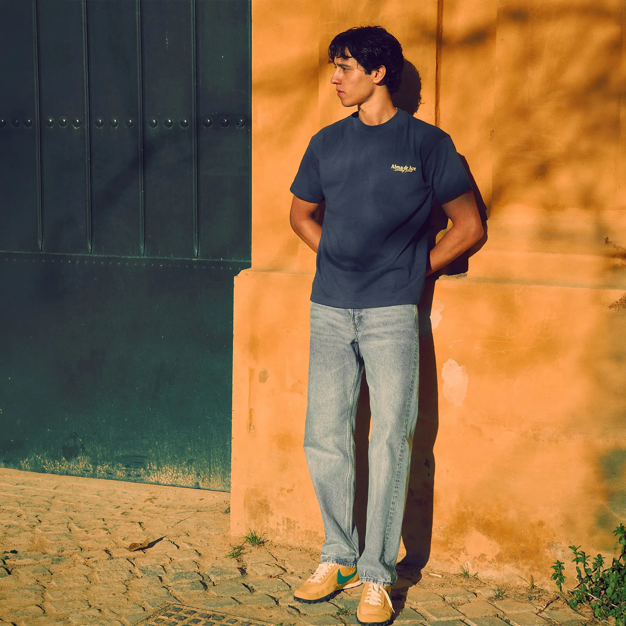 Front Model View of Alma De Ace Sporting Goods Midnight Blue T-Shirt