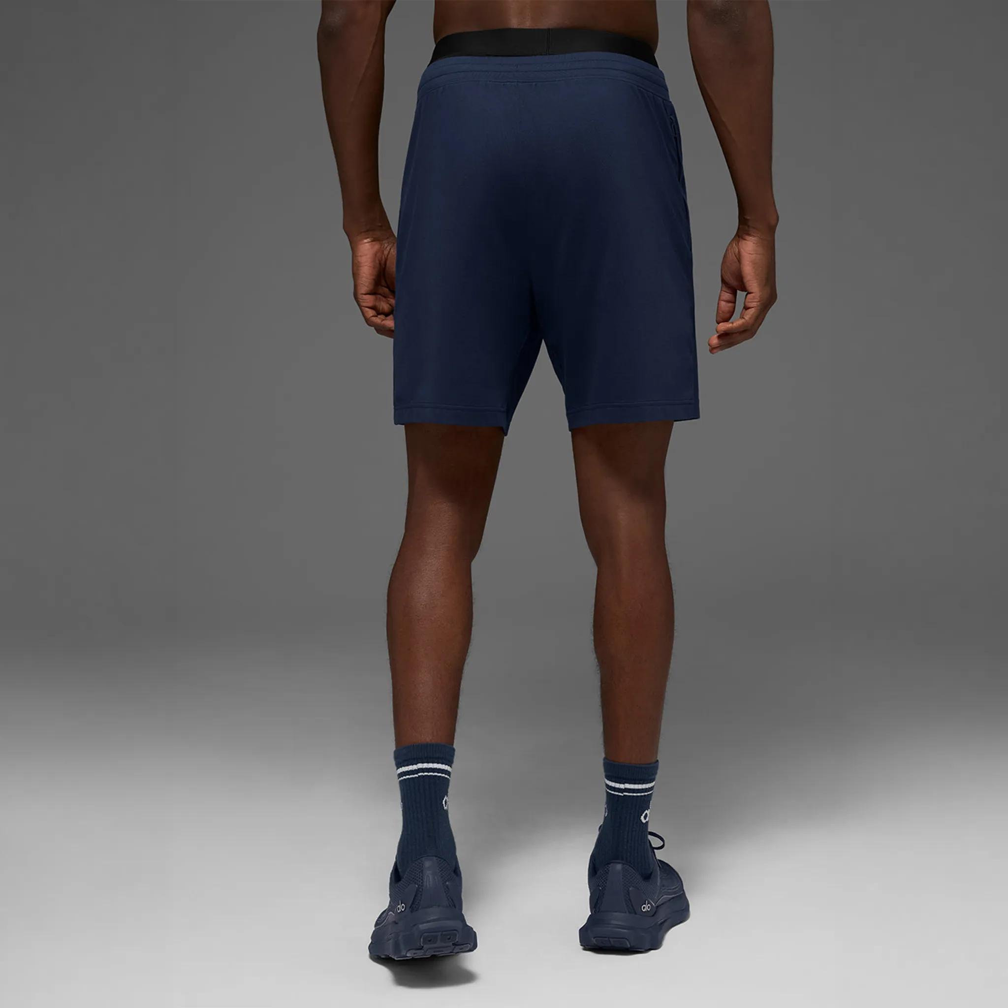 Back View of Alo Yoga 7inch Conquer React Performance Navy Shorts
