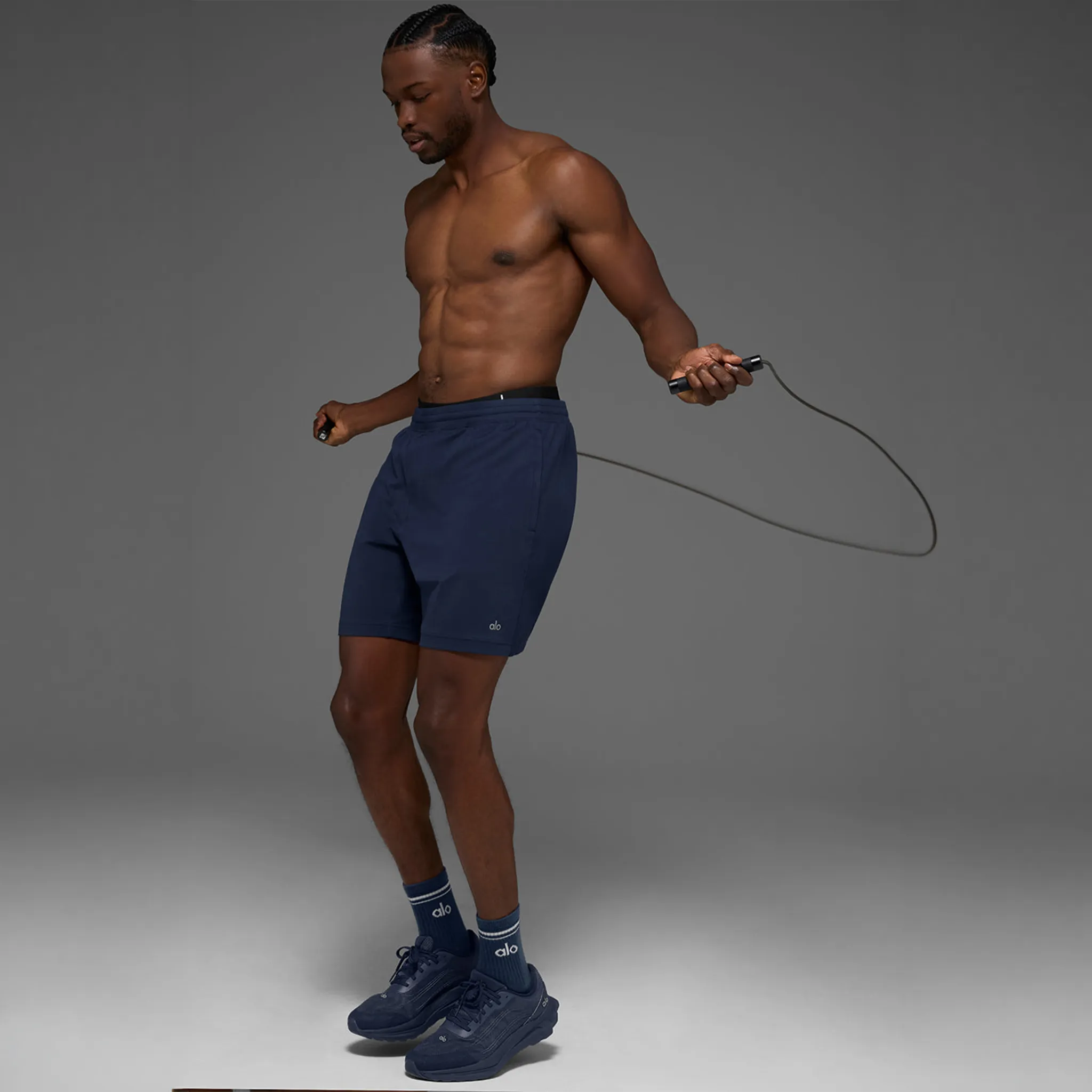 Front Side View of Alo Yoga 7inch Conquer React Performance Navy Shorts