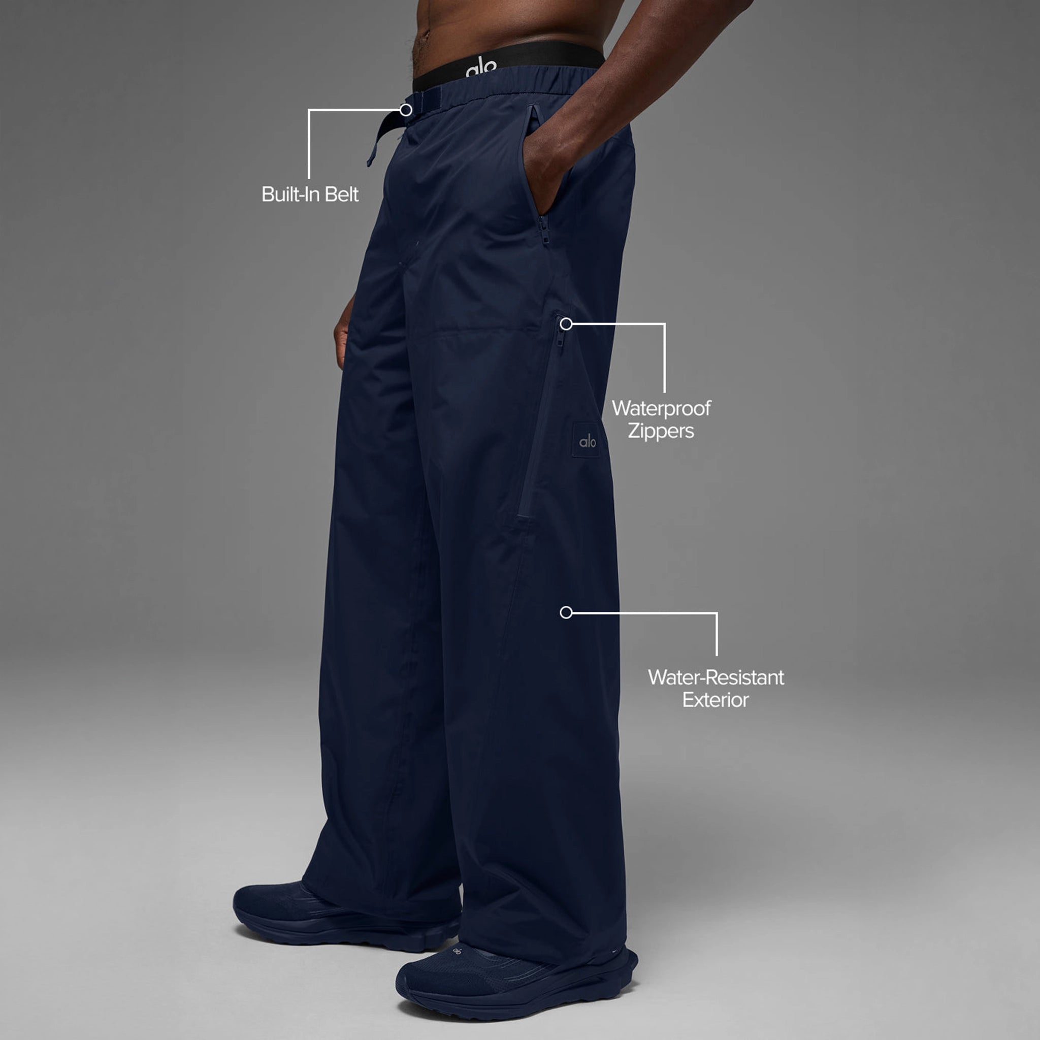 Front Side View of Alo Yoga Alpha Shell Navy Pants