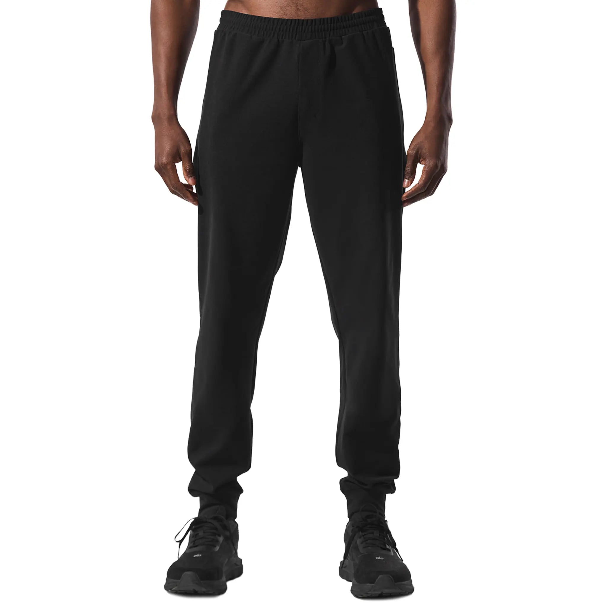 Front View of Alo Yoga Conquer Max Performance Black Sweatpants