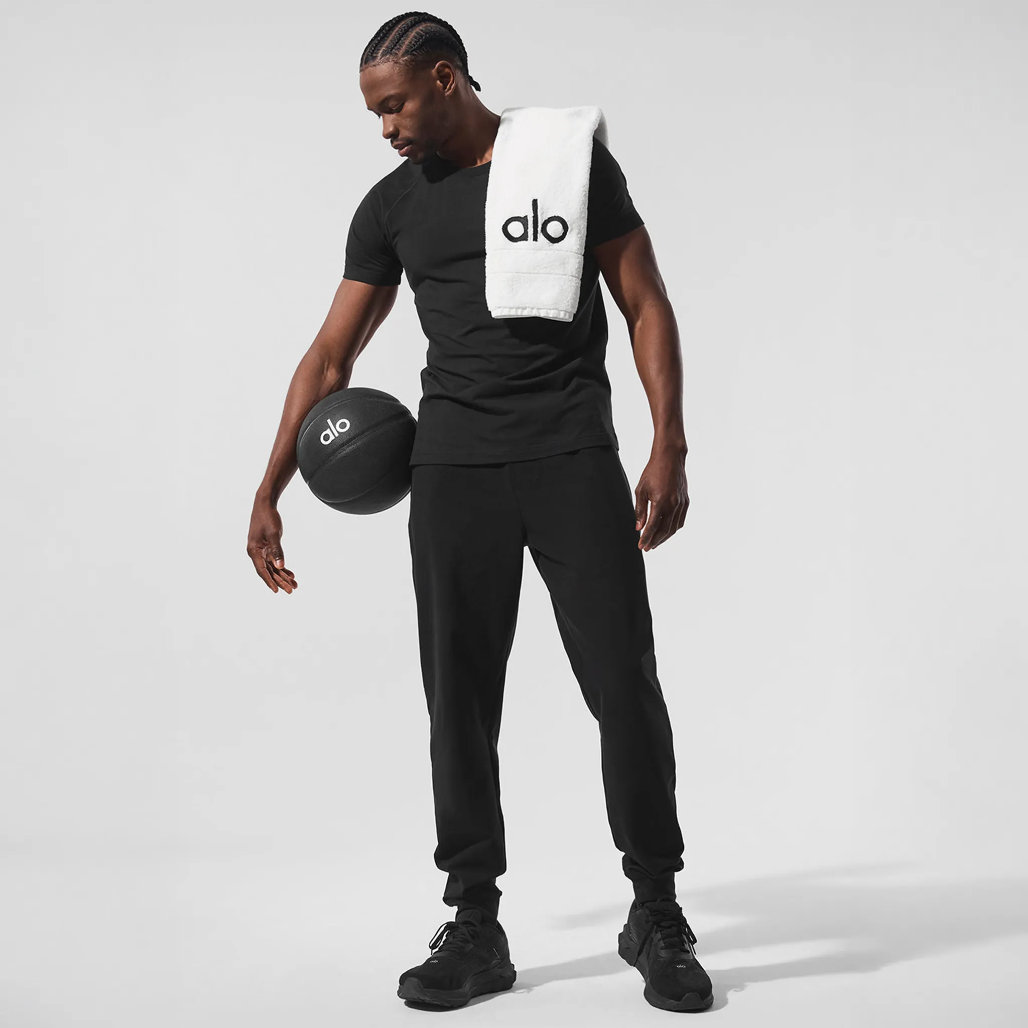 Model View of Alo Yoga Conquer Max Performance Black Sweatpants