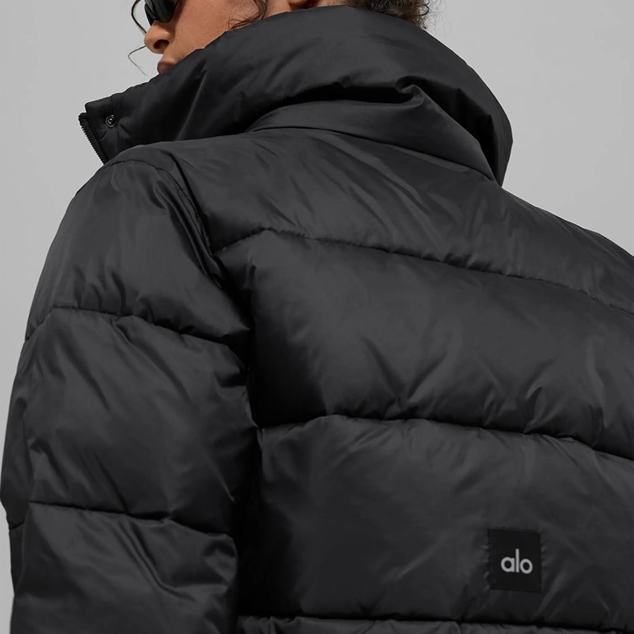 Detailed View of Alo Yoga Gold Rush Black Puffer Jacket (W)