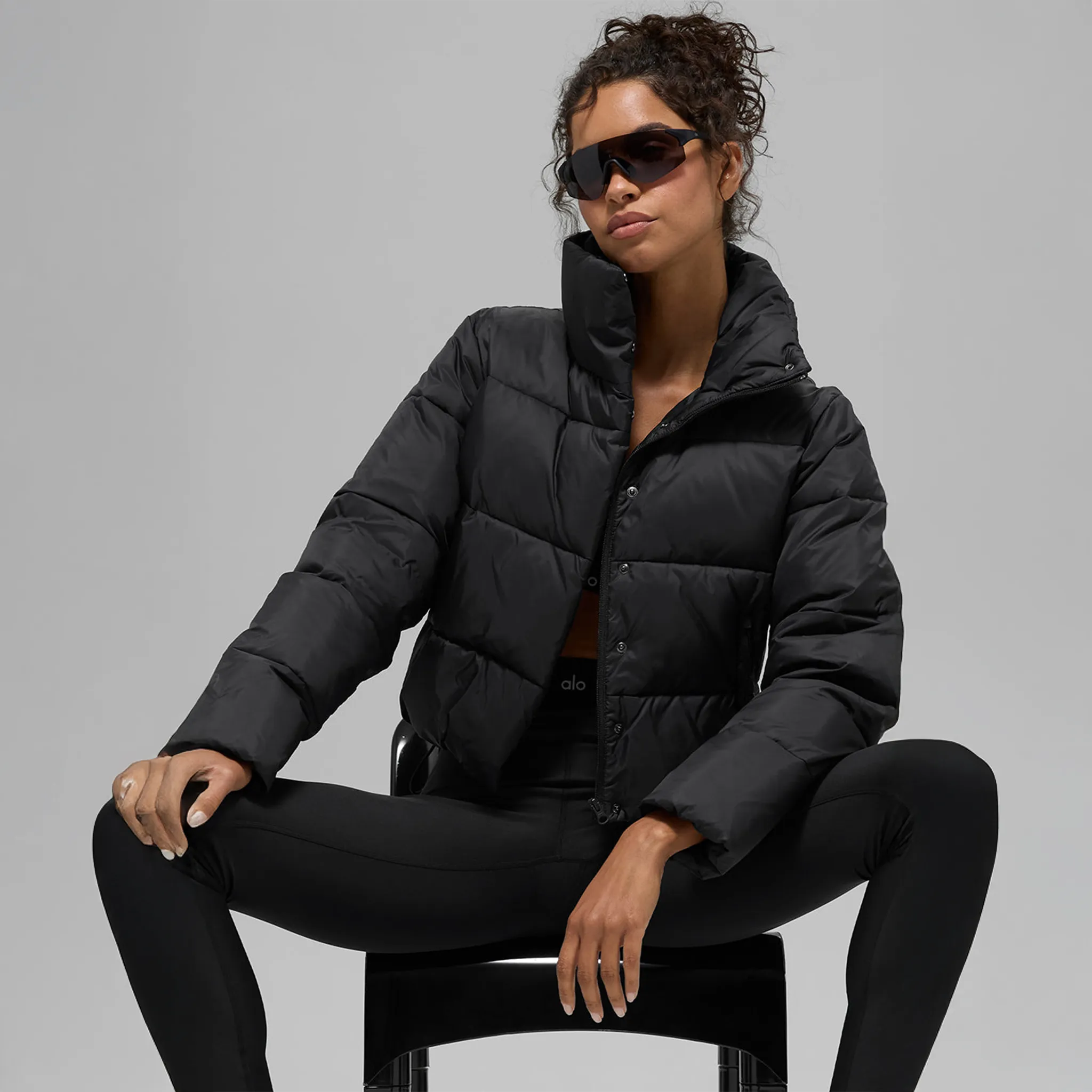 Front View of Alo Yoga Gold Rush Black Puffer Jacket (W)