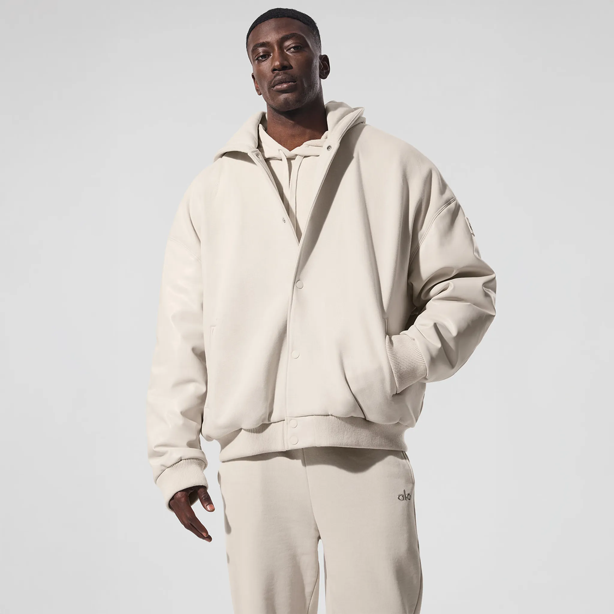 Front View of Alo Yoga Select Hooded Bone Bomber Jacket