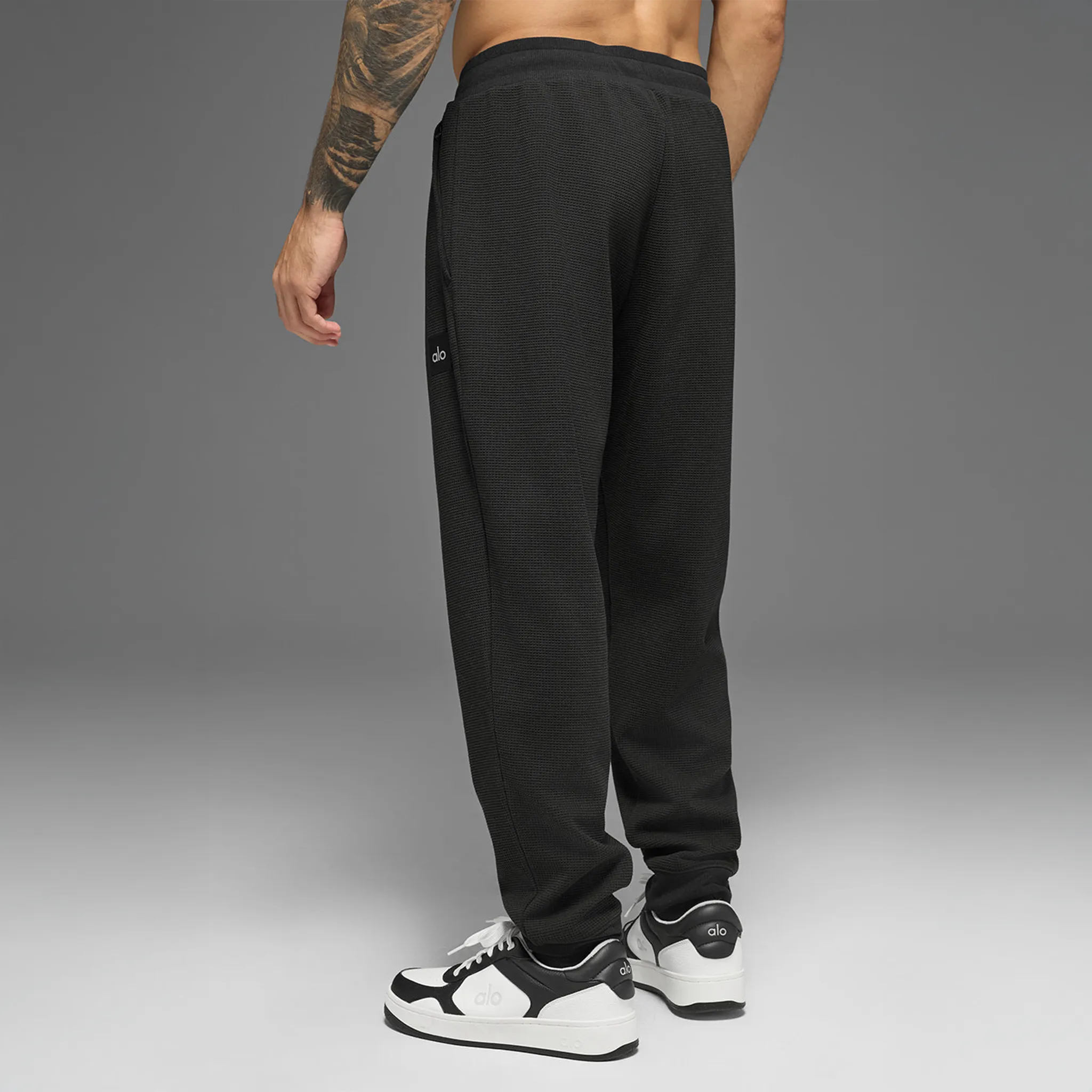 Back View of Alo Yoga Waffle Lounge Black Sweatpants