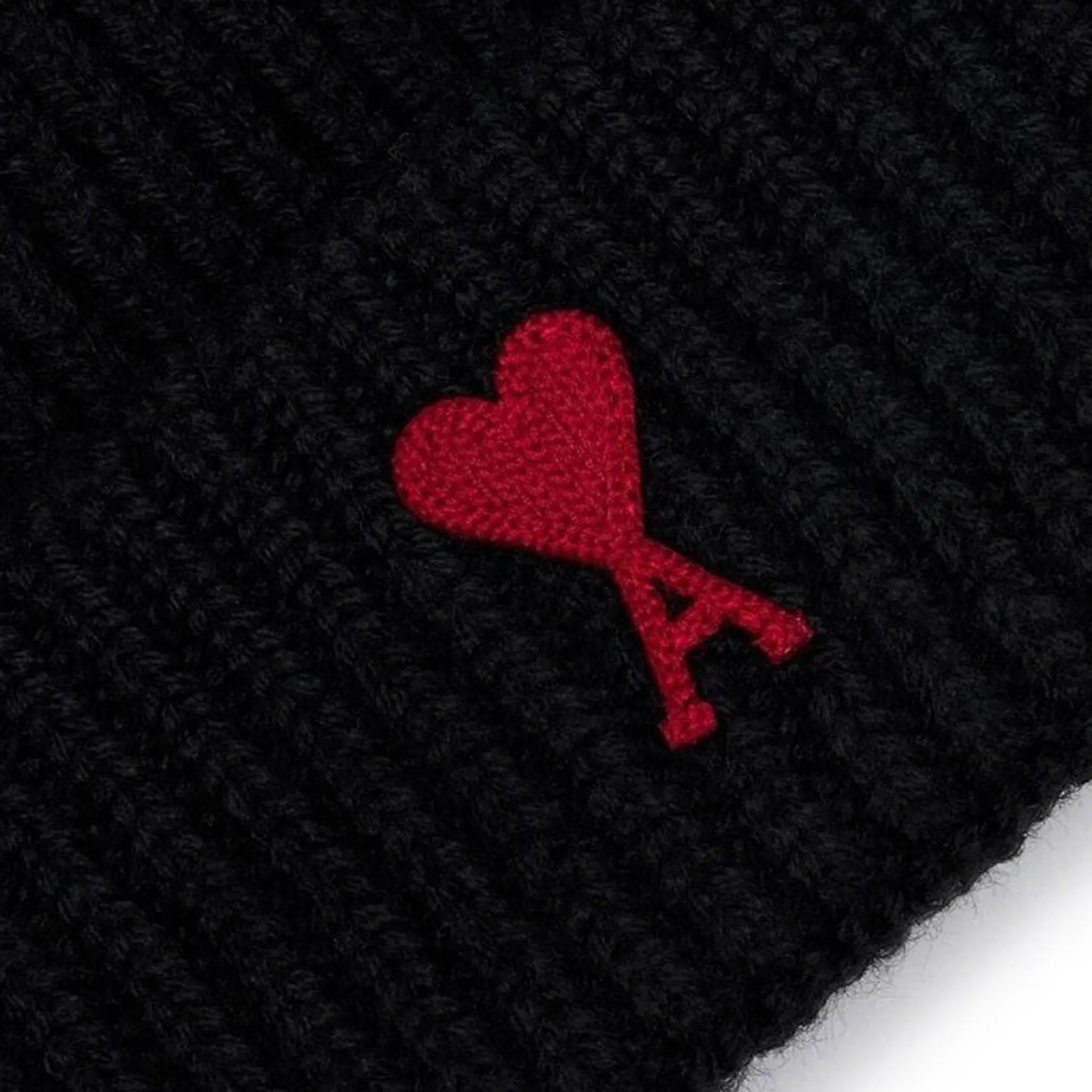 Detail view of Ami Paris Red ADC Black Beanie Hat h23bfuha106018