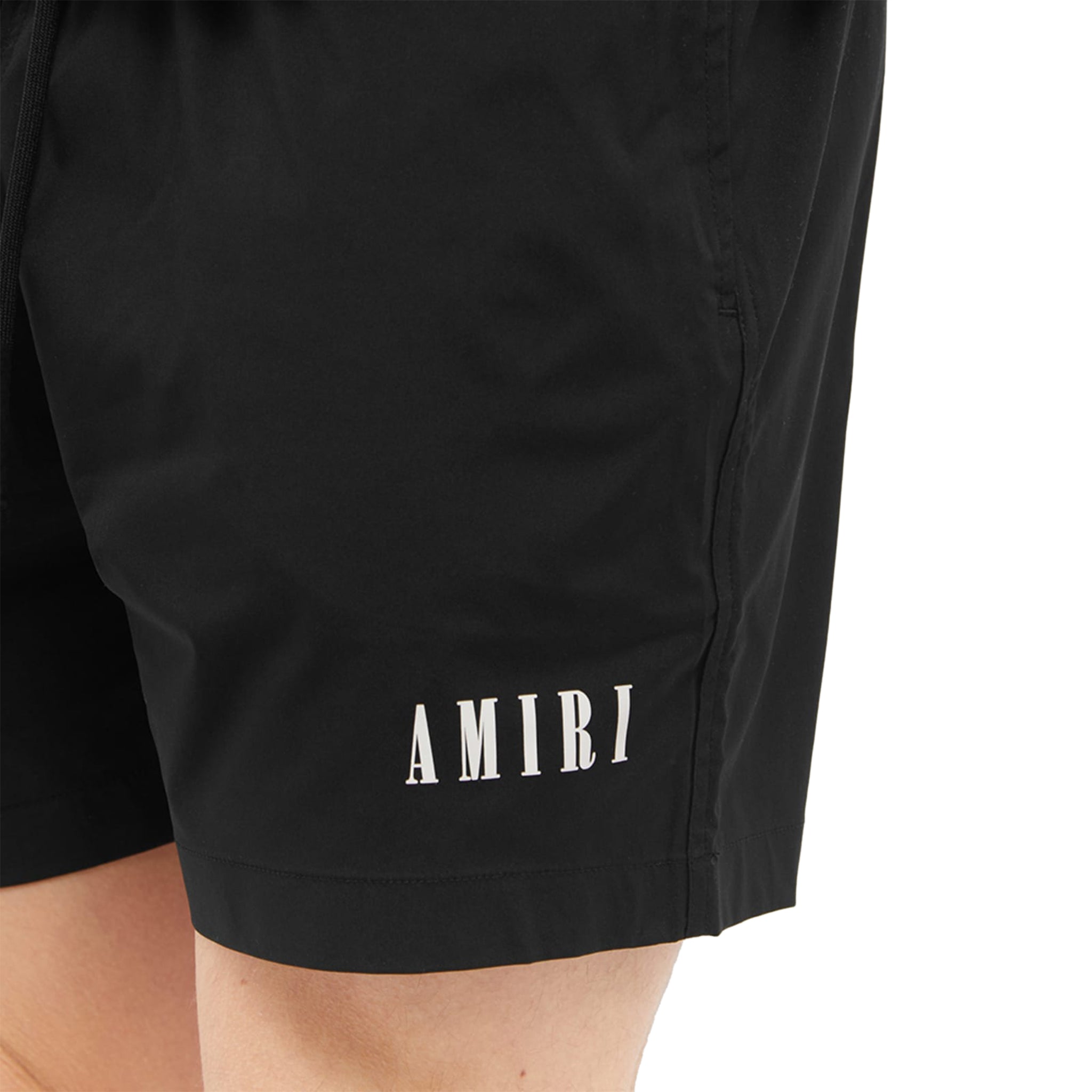 Close side of Amiri Core Logo Swim Shorts Black PXMSB001-001