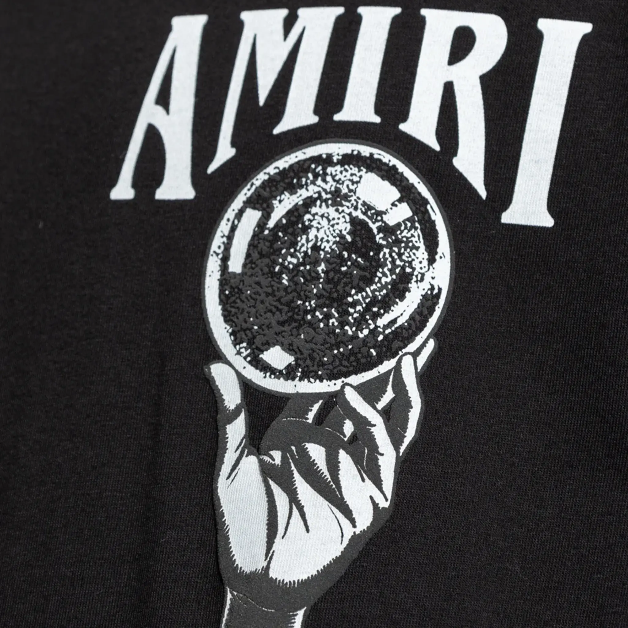 Detail view of Amiri Crystal Ball Long Sleeve Black T Shirt PS23MJG006-001