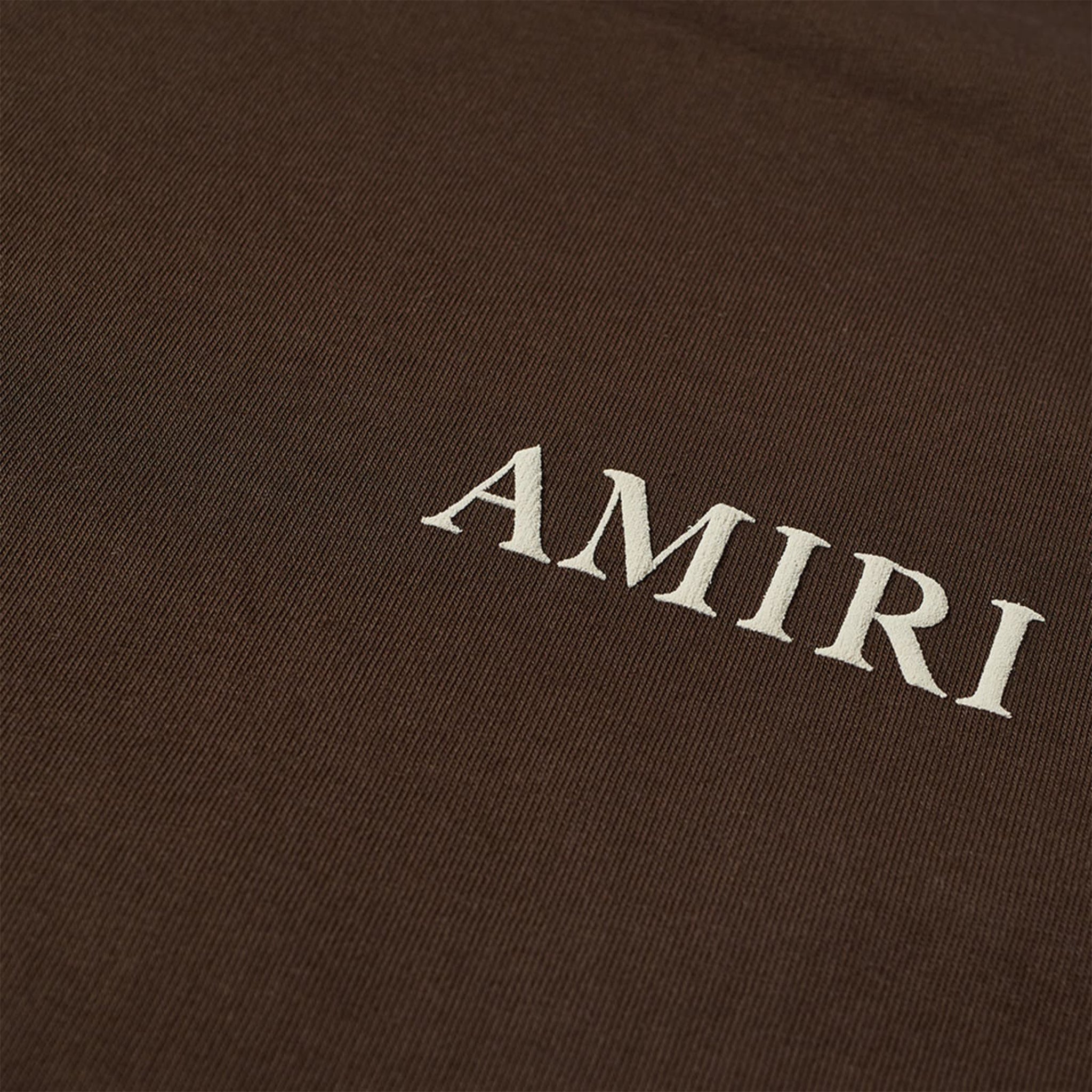 Chest logo view of Amiri Puff Logo T Shirt Brown AW22MJL010-210