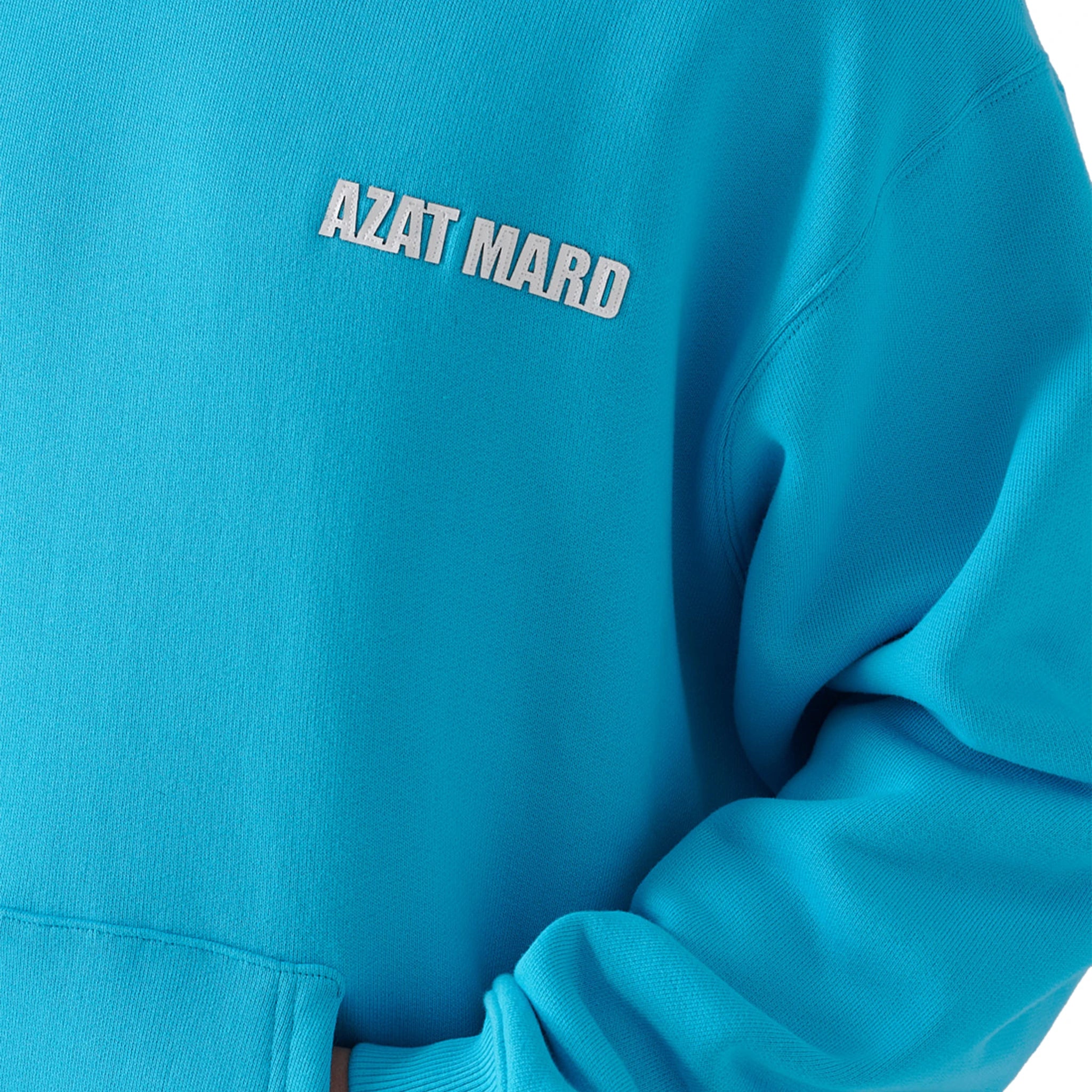 Model chest view of Azat Mard Turquoise Hoodie MW21S159
