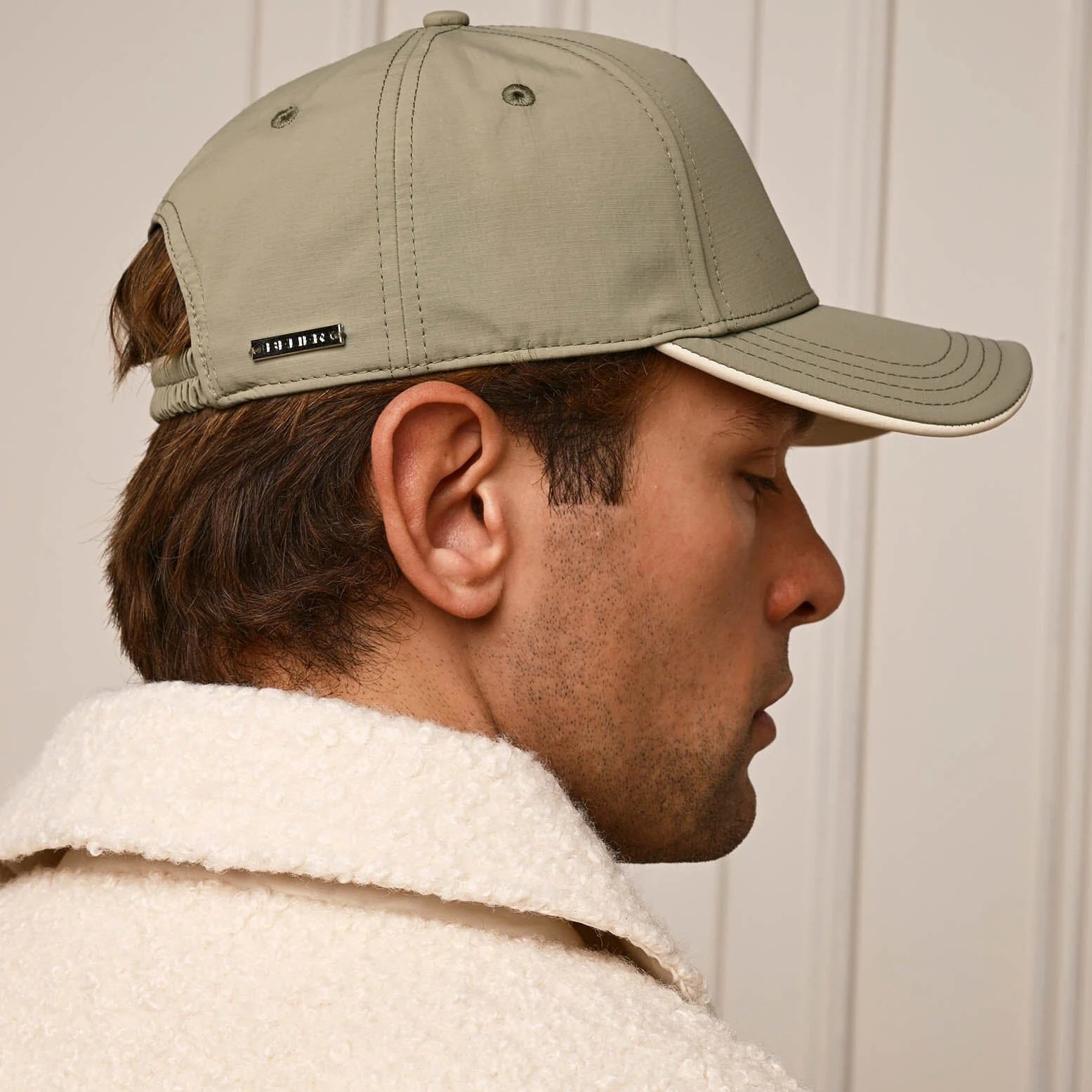 Model Side View of Belier Crest Logo Taupe Cap  BA006TPE