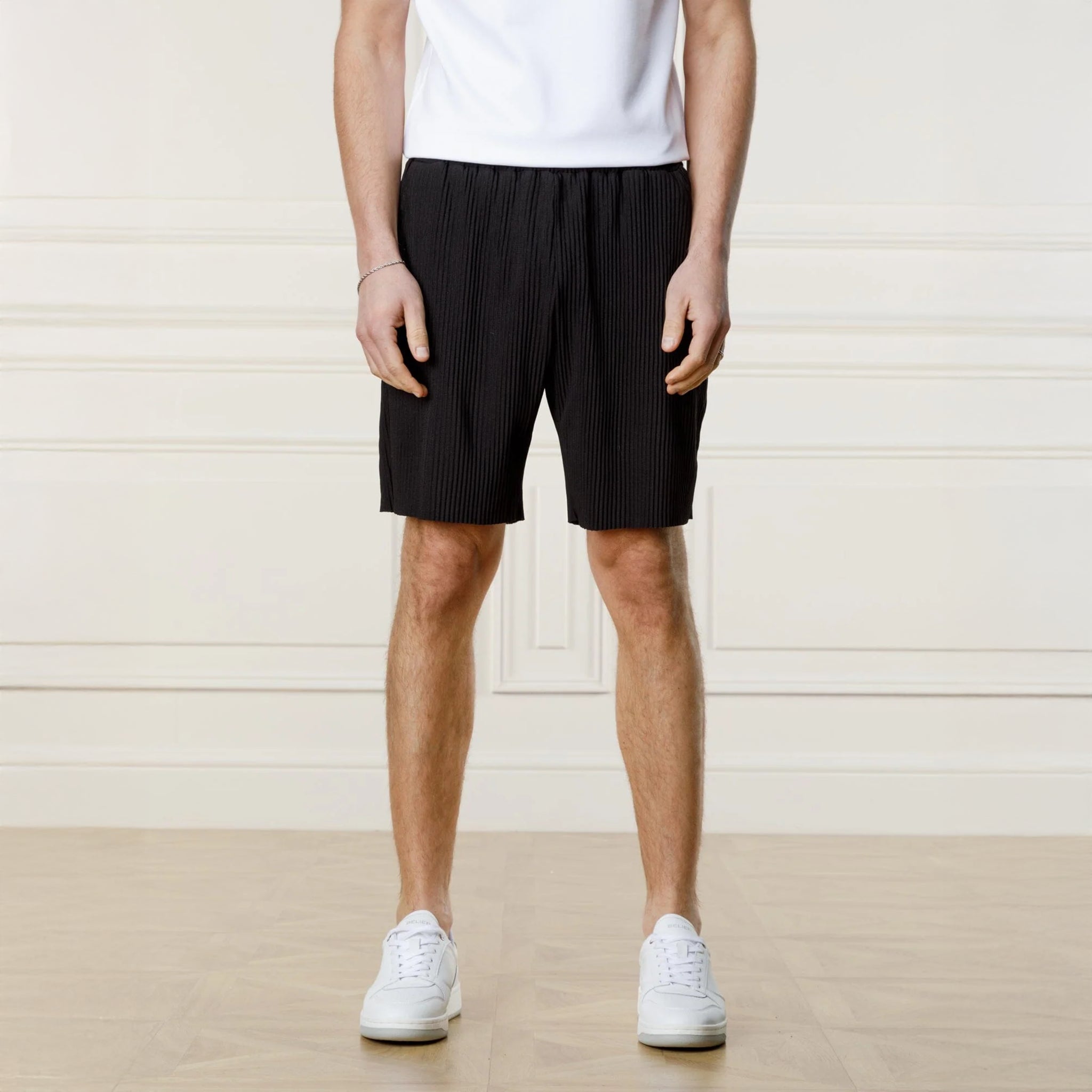 Front View of Belier Pleated Black Shorts