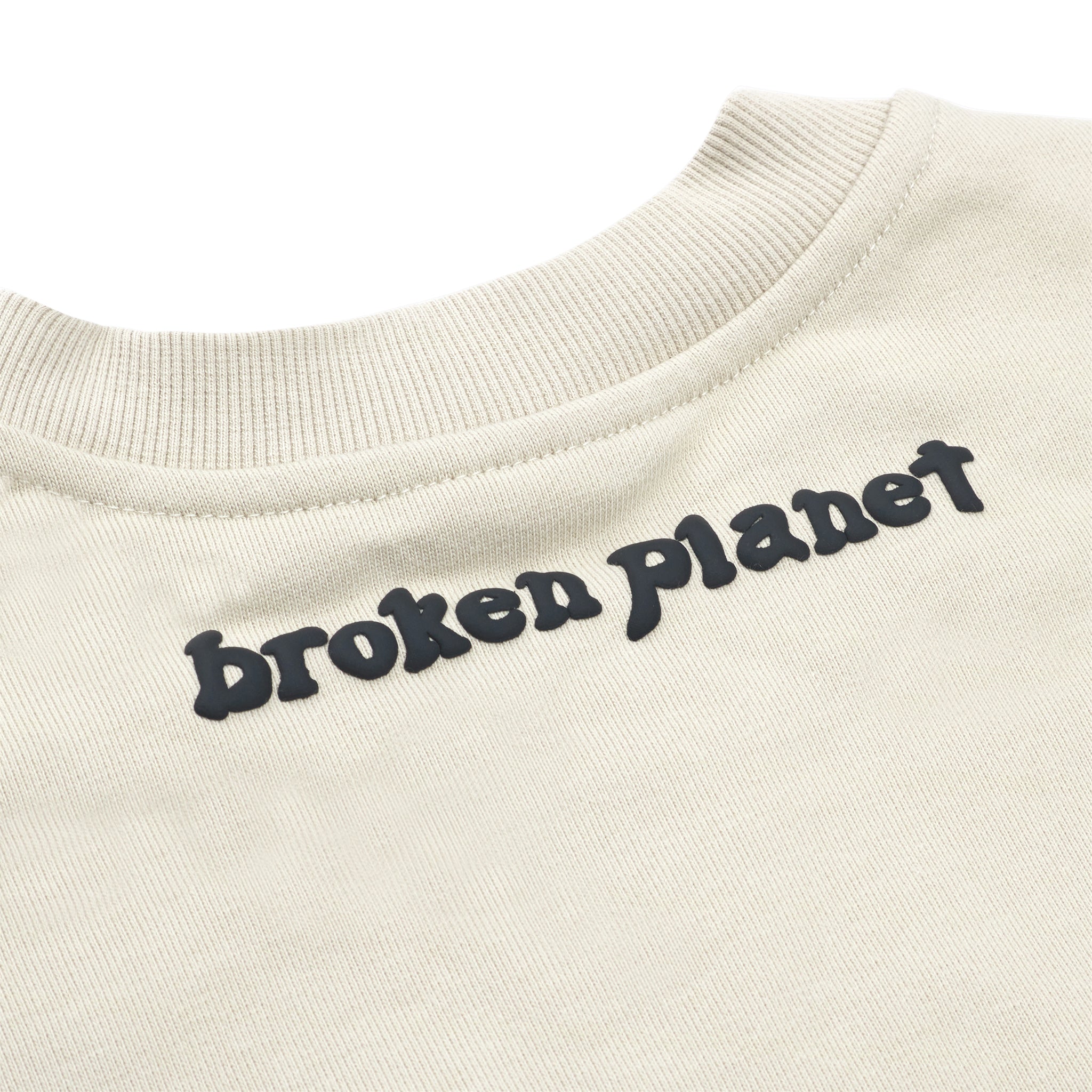 Back close up view of Broken Planet Find Your Balance Bone White Crewneck BP-FYB-CN-B_WHITE