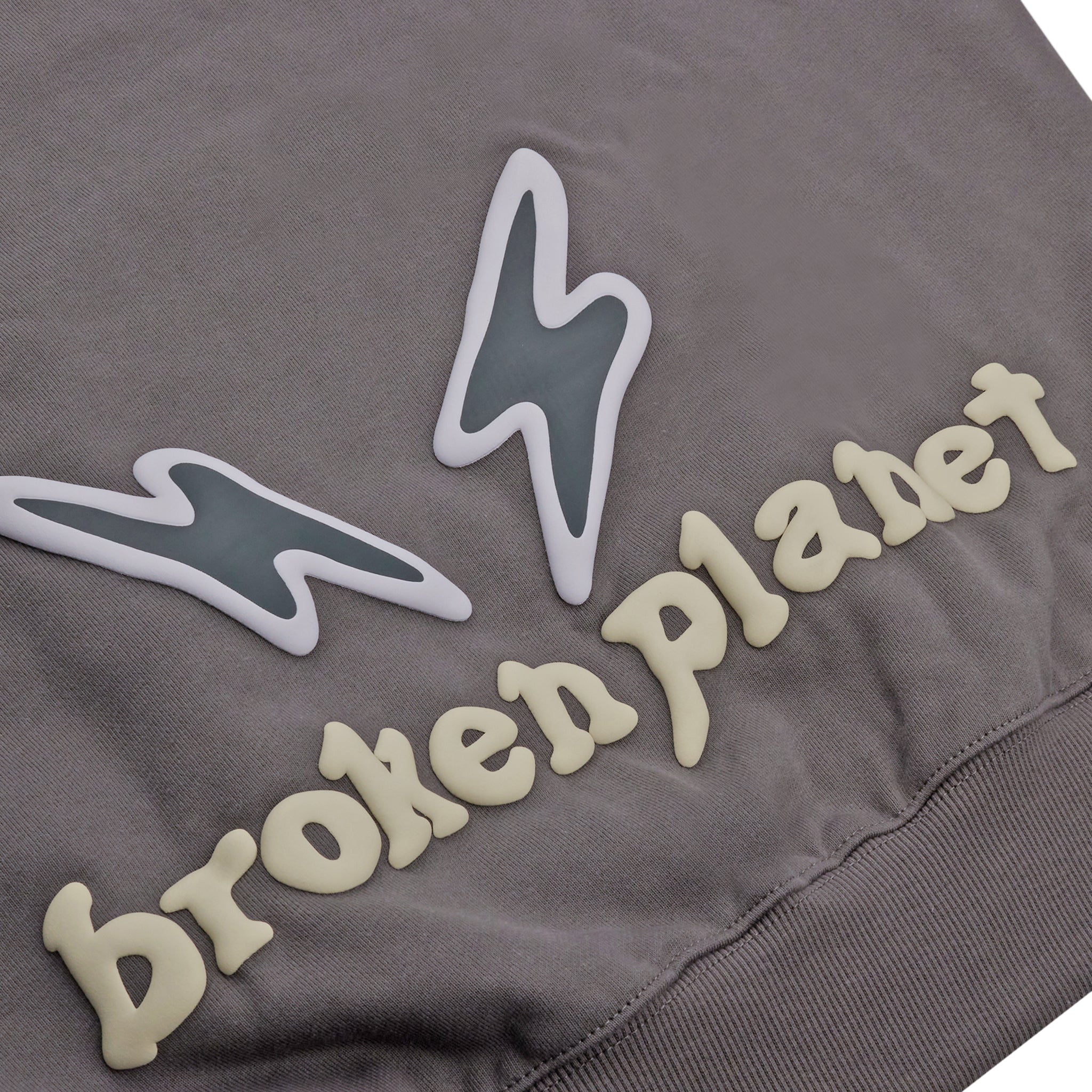 Back logo view of Broken Planet Find Your Balance Ash Grey Hoodie