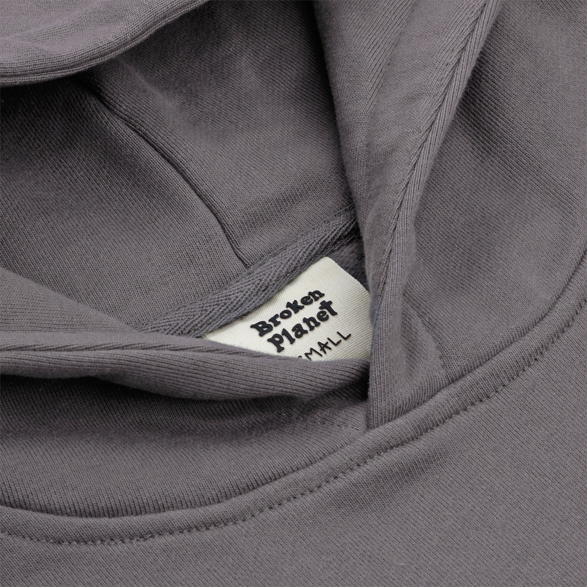 Neck view of Broken Planet Find Your Balance Ash Grey Hoodie