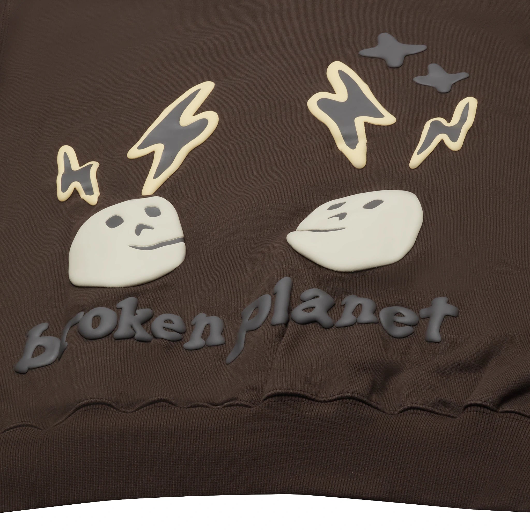 BAck logo view of Broken Planet Shift Of Energy Dark Brown Hoodie