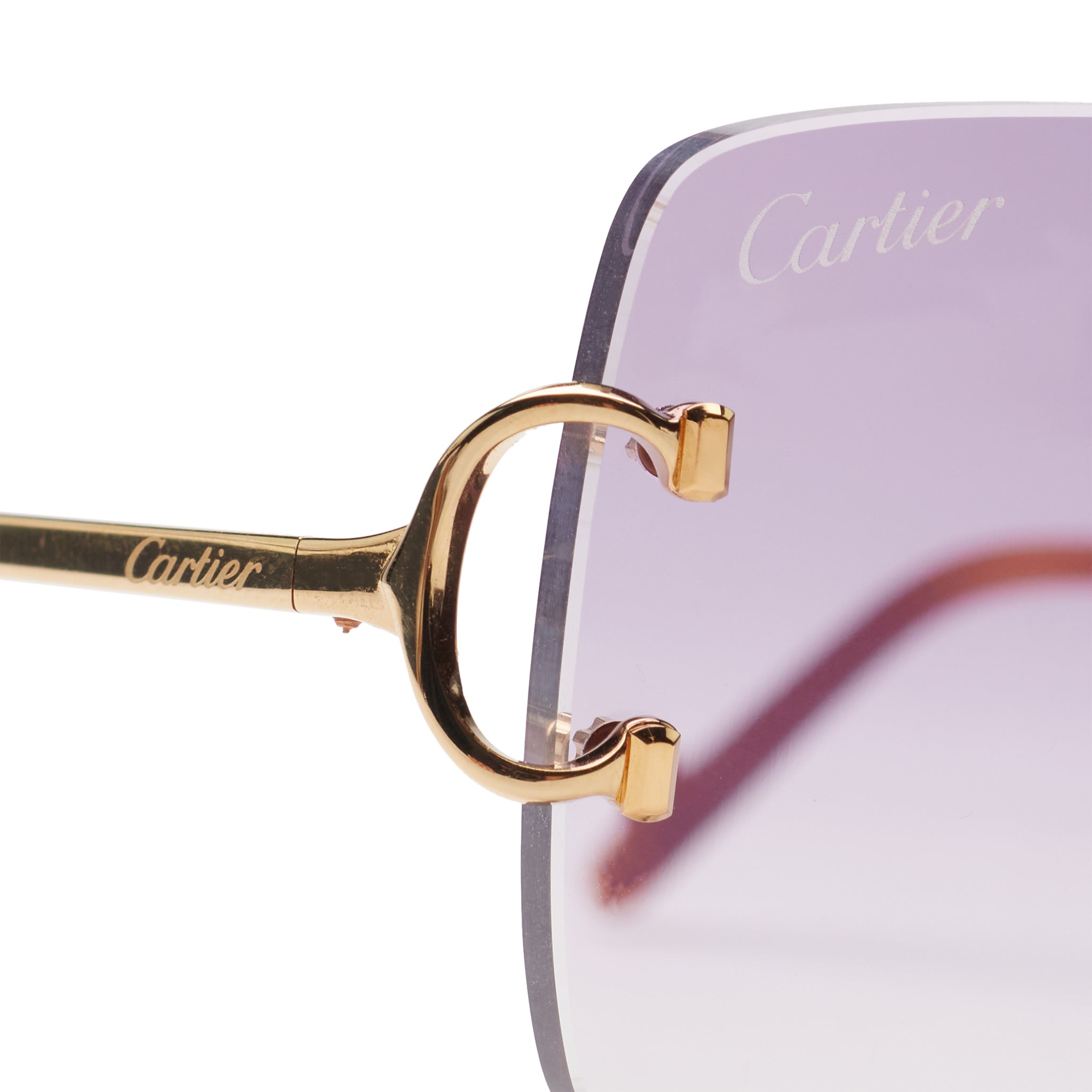 detail view of Cartier Eyewear Custom CT00920-001 C Decor Blue Rimless Sunglasses