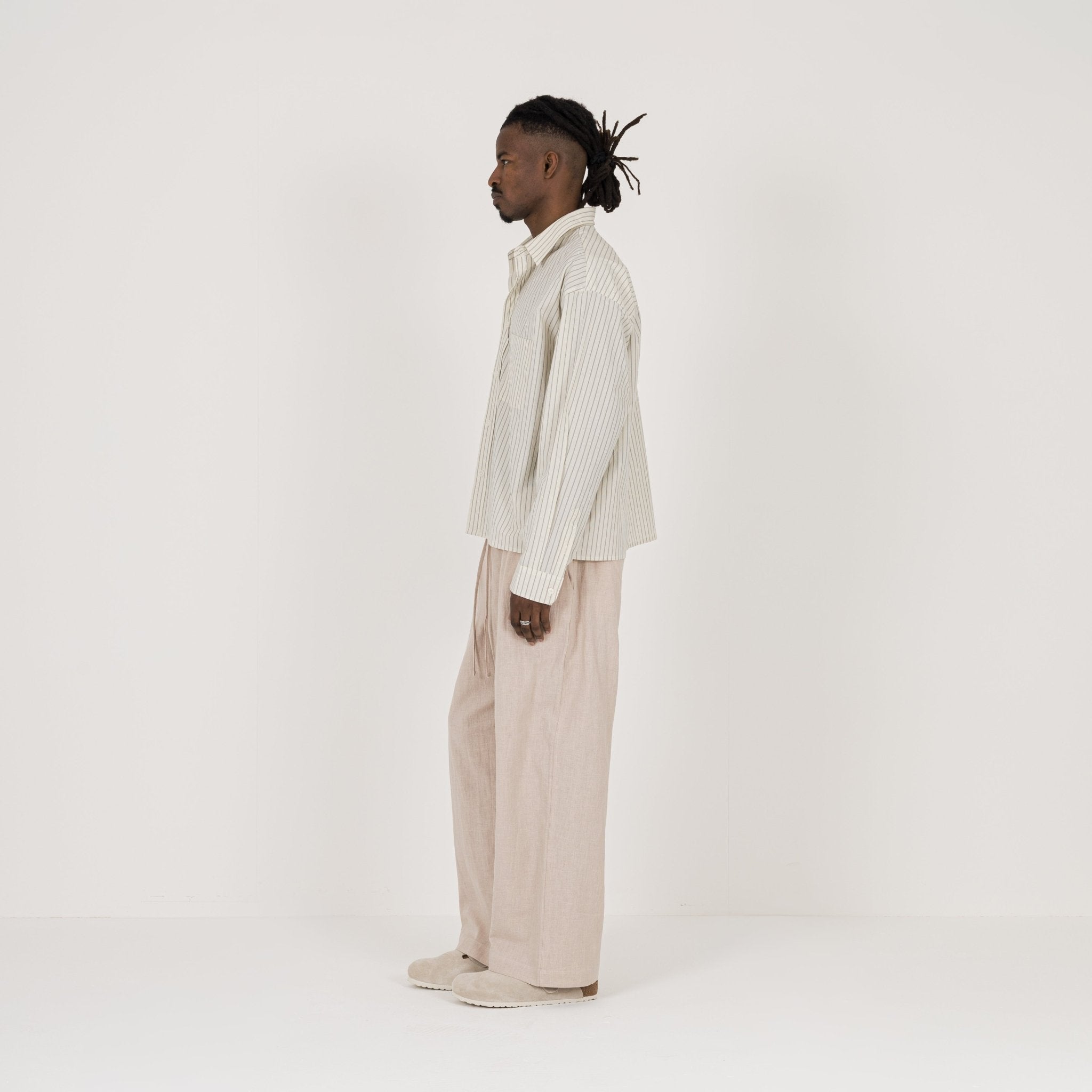 Model Side view of Destructive Cropped L/S Bone Pinstripe Shirt