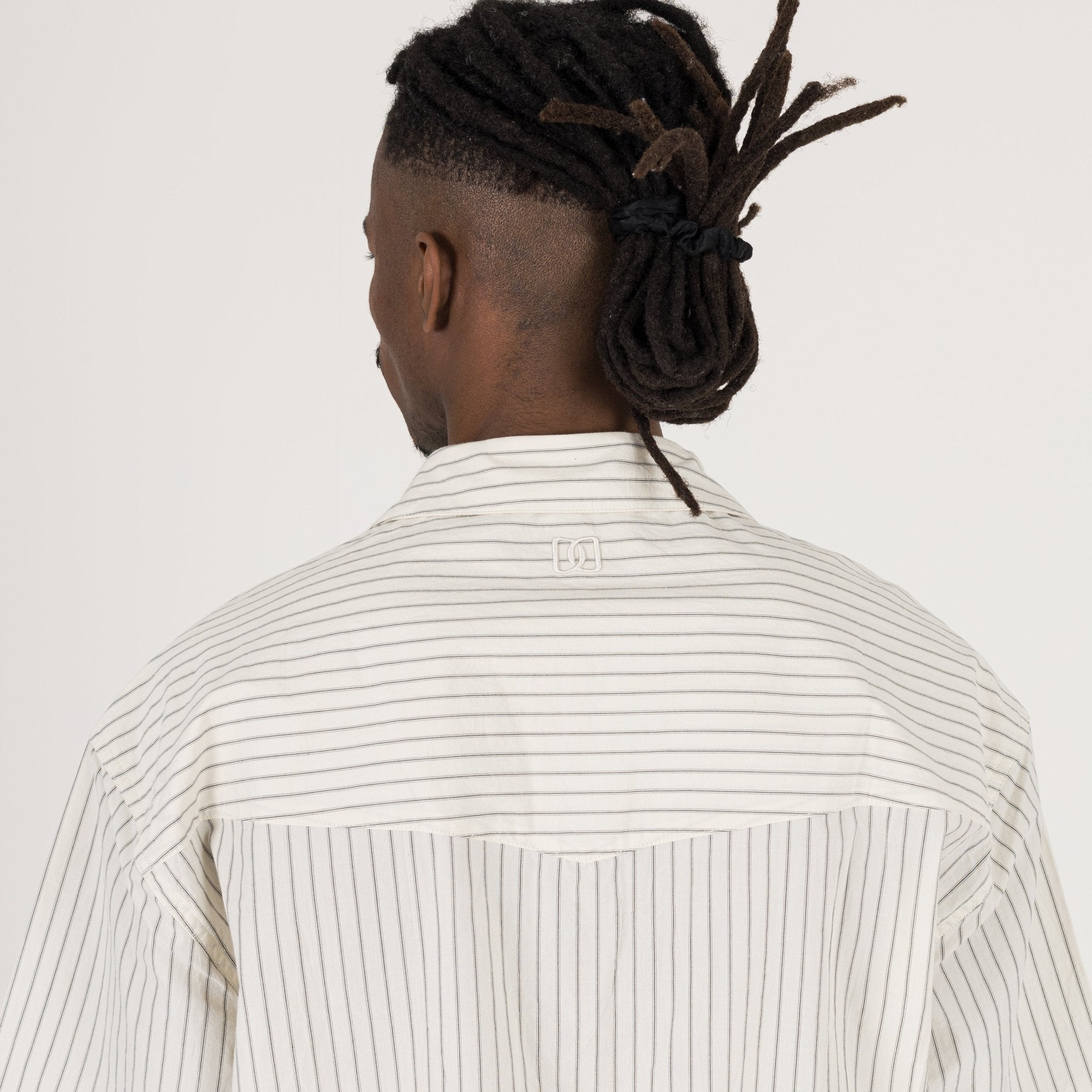 Model view of Destructive Cropped Bone Pinstripe Shirt
