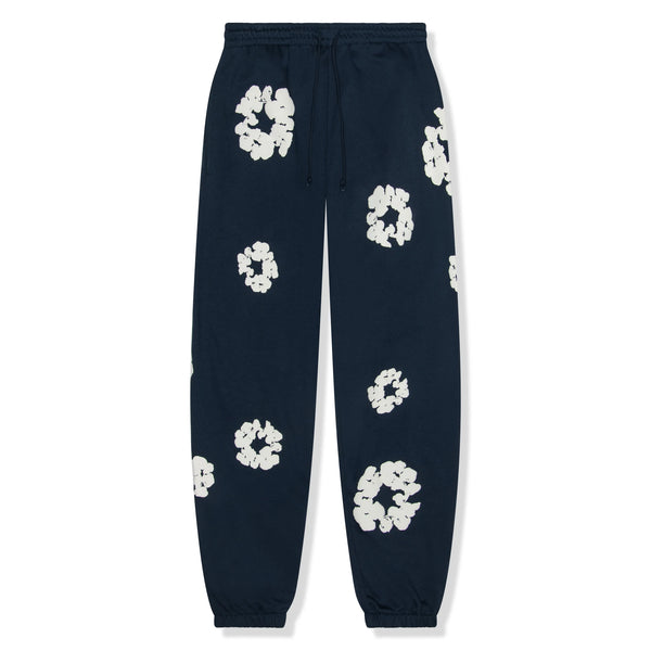Front view of Denim Tears The Cotton Wreath Navy Sweatpants 