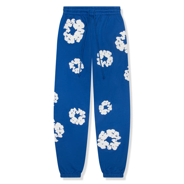 Front view of Denim Tears The Cotton Wreath Royal Blue Sweatpants 