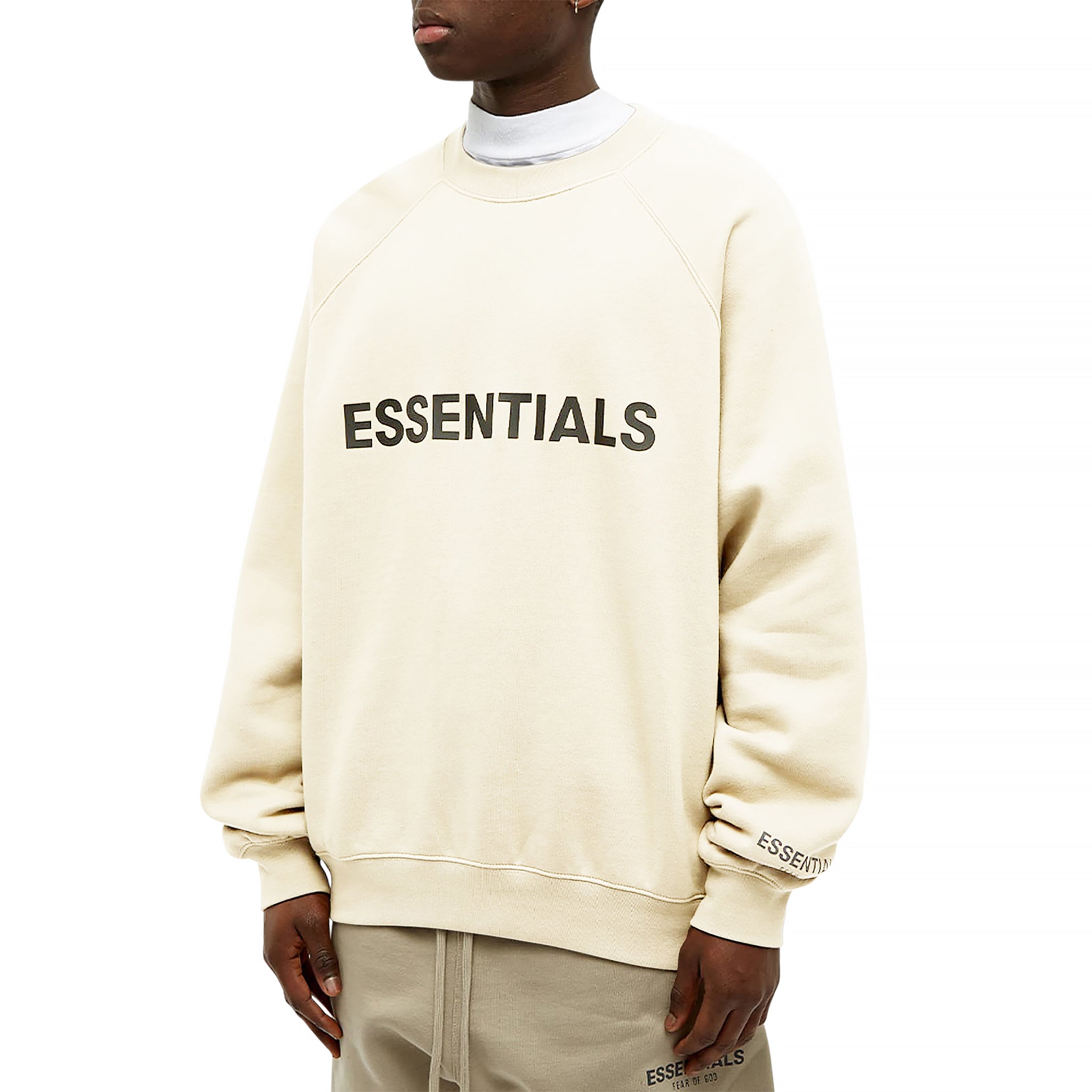 Model front view of Fear Of God Essentials Buttercream Crewneck