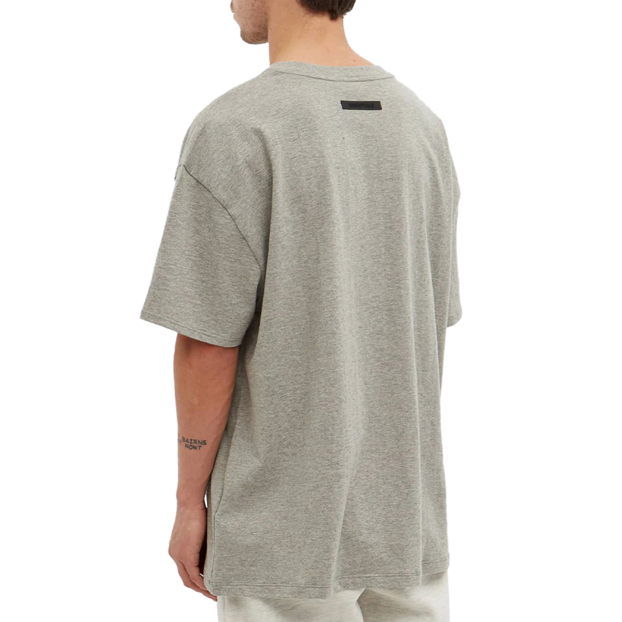 Model back view of Fear Of God Essentials Core Collection Dark Heather Oatmeal T-Shirt