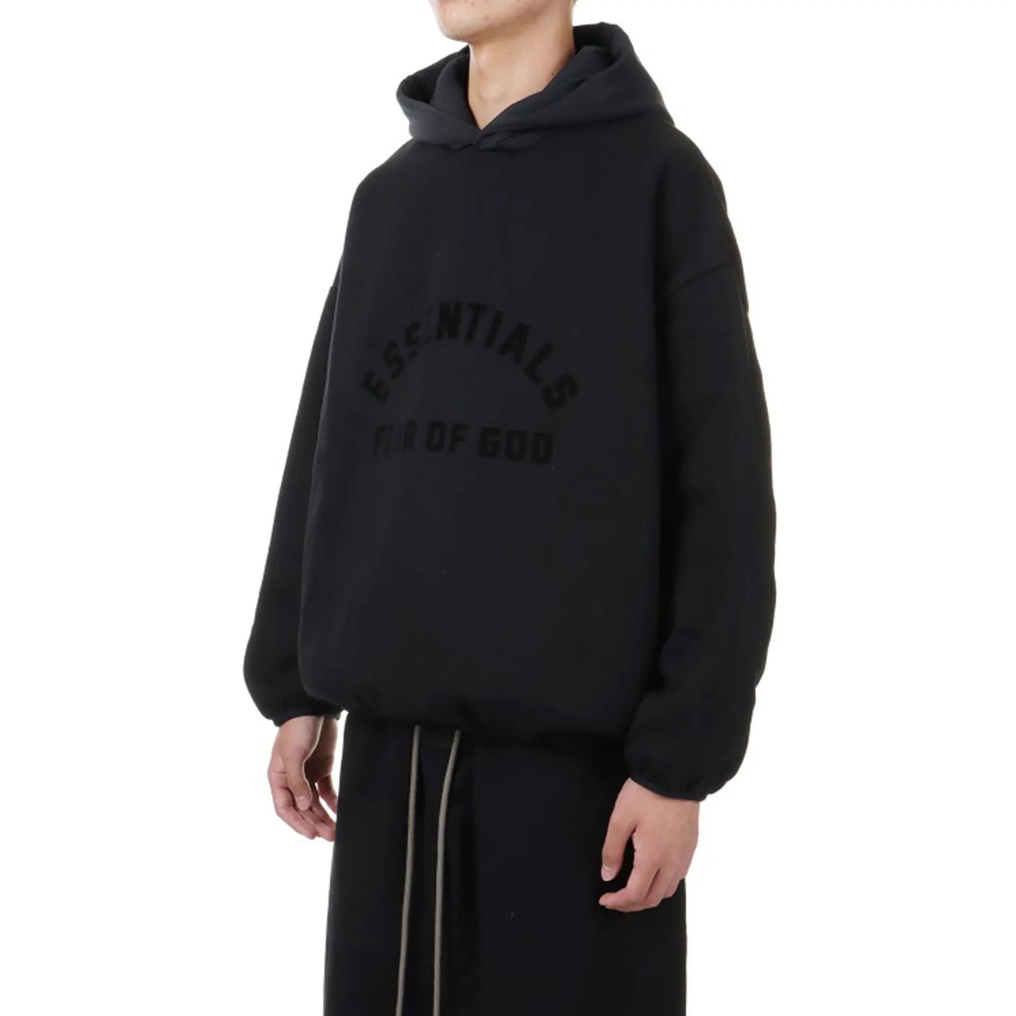Model Front Side View of Fear Of God Essentials Core Collection Nylon Fleece Black Hoodie (SS24) 202SU244310F