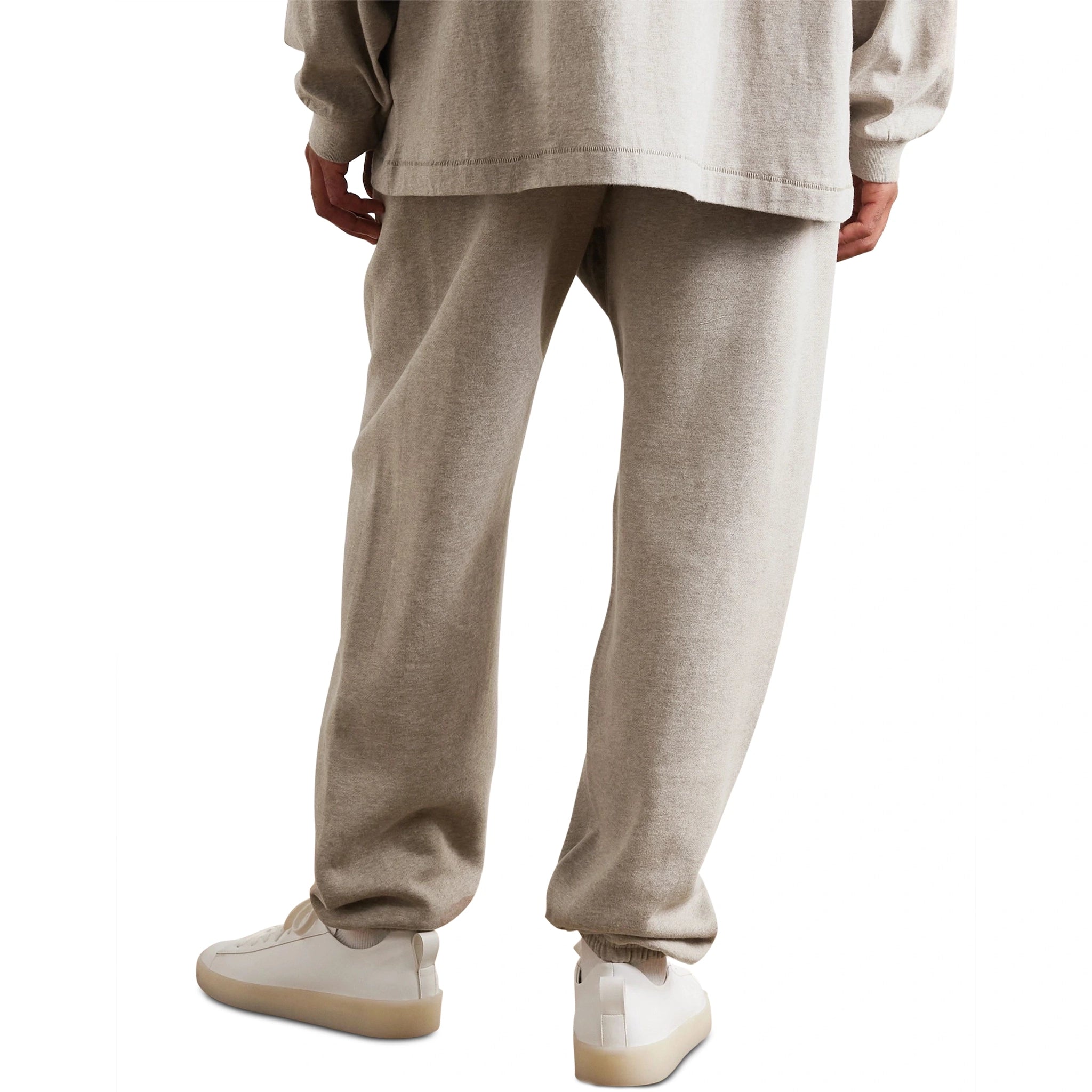 Model back view of Fear Of God Essentials Core Heather Sweatpants (FW23)