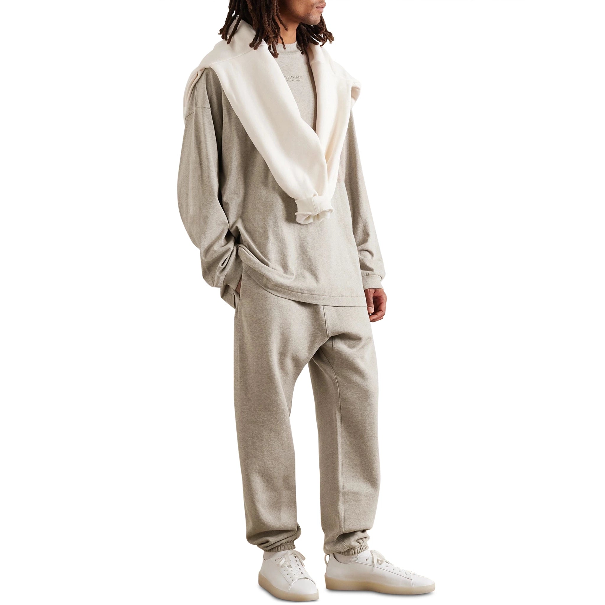 Model front view of Fear Of God Essentials Core Heather Sweatpants (FW23)