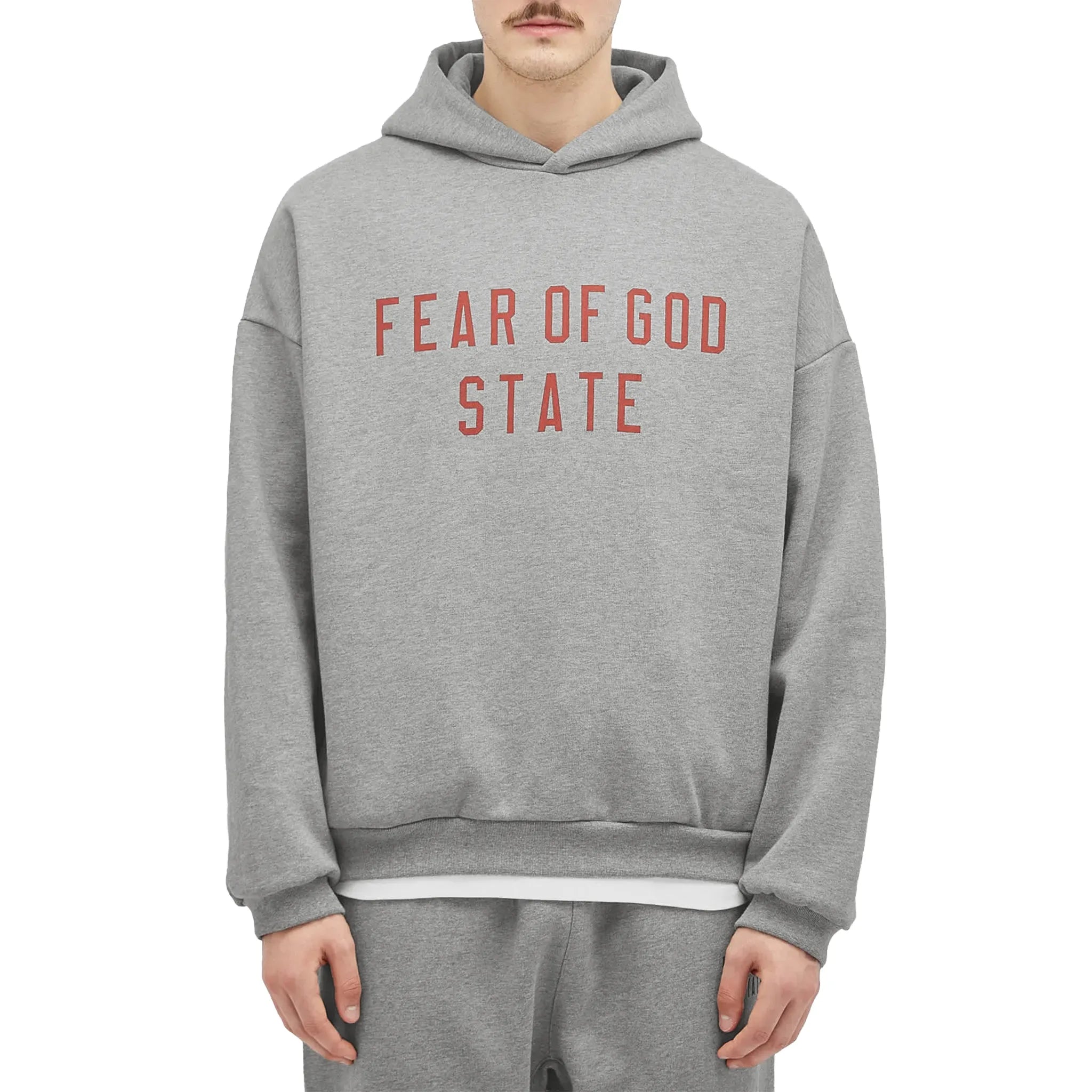 Model Front View of Fear Of God Essentials Dark Heather Grey State Hoodie 192BT246251F