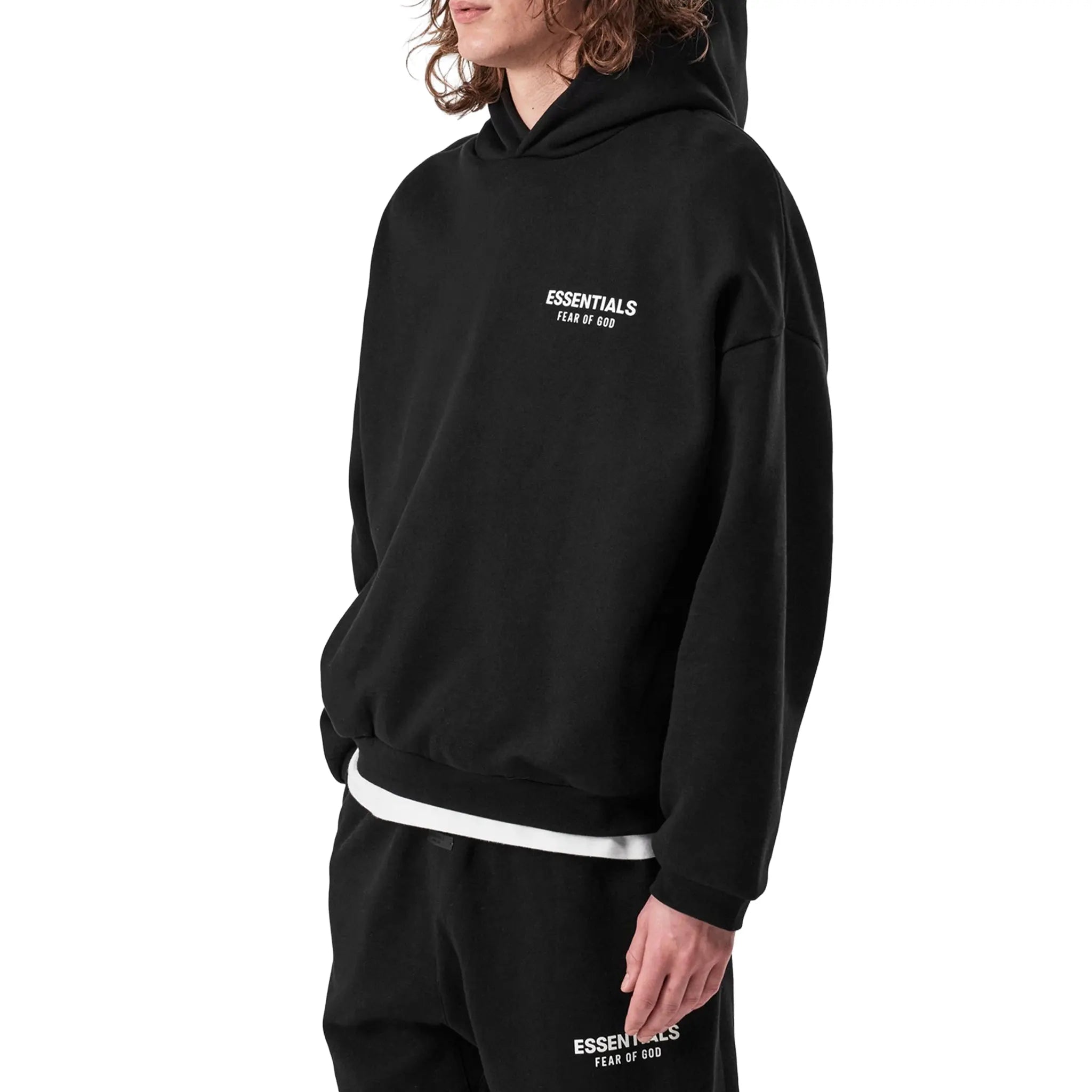 Model Front Side View of Fear Of God Essentials Fleece Black Hoodie (FW24) 192BT246250F