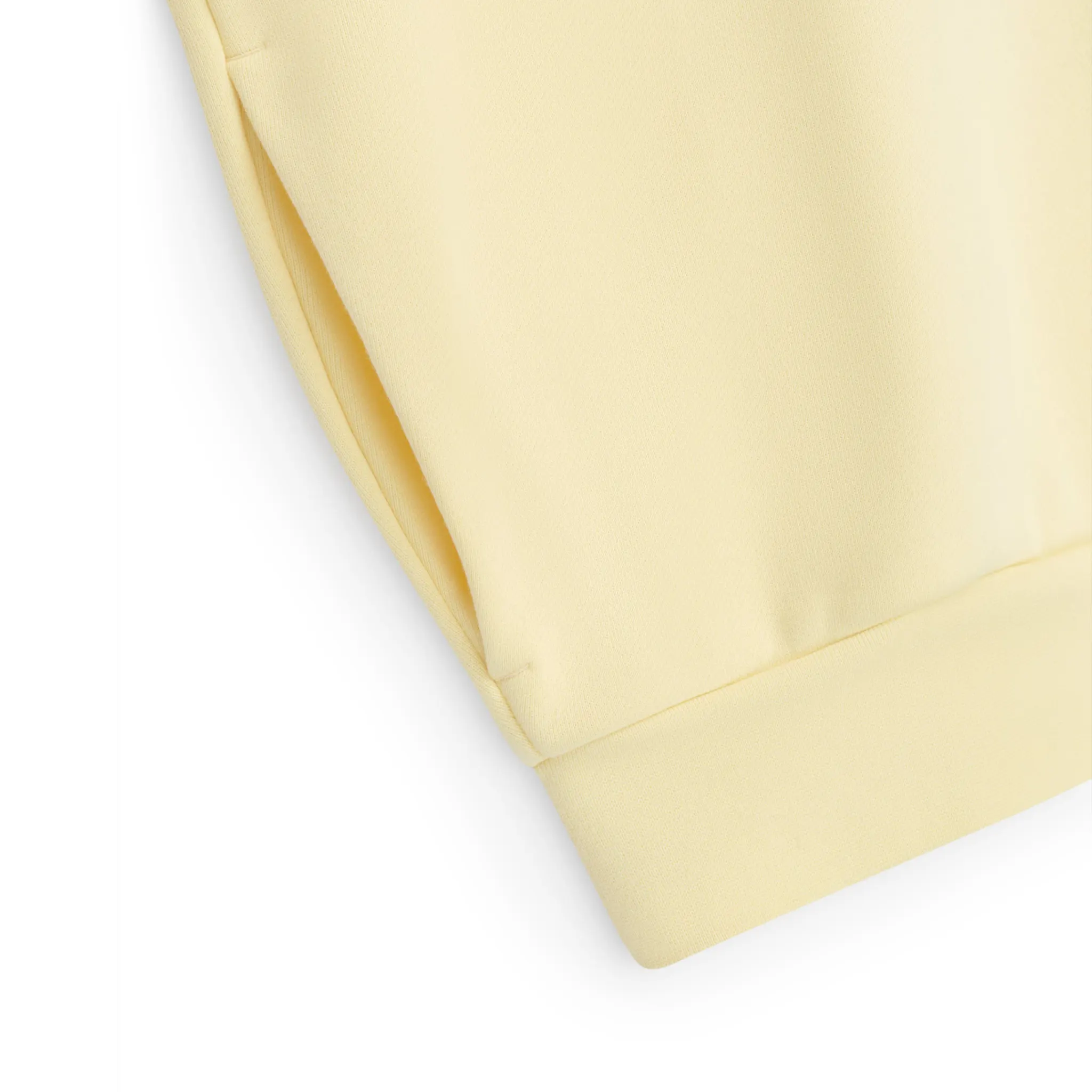 Detail view of Fear Of God Essentials Garden Yellow Crewneck (FW23) 192SP244681F