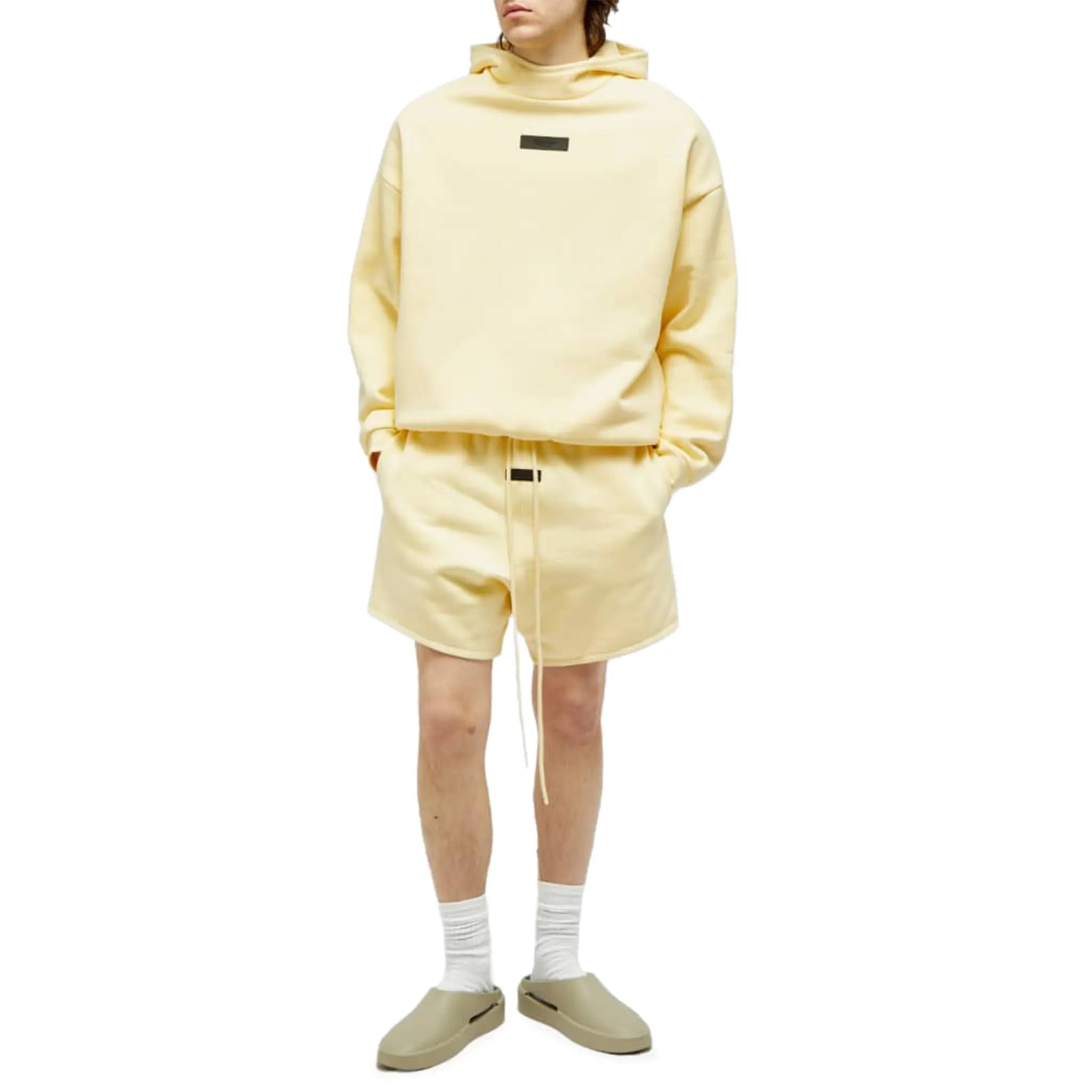 Model view of Fear Of God Essentials Garden Yellow Hoodie (FW23) 192SP242051F