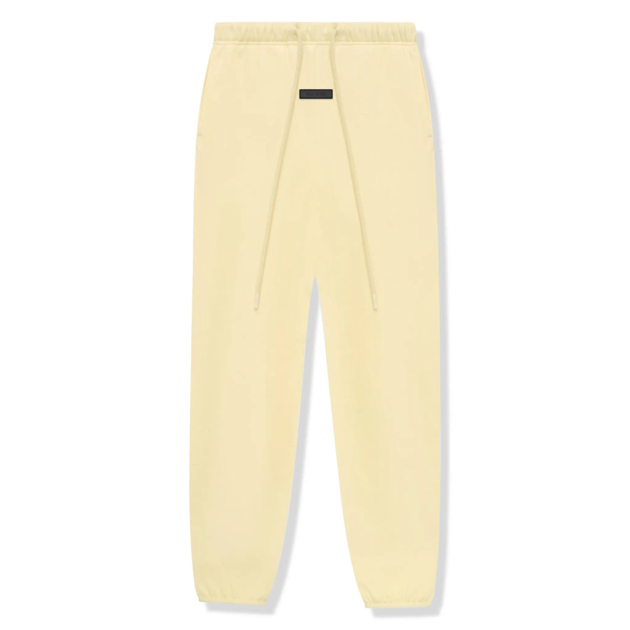 Front view of Fear Of God Essentials Garden Yellow Sweatpants (FW23) 130SP242021F